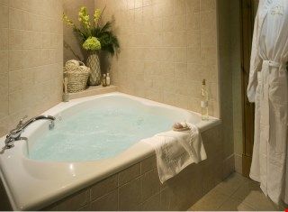 image Soak sore muscles in the luxurious soaker tub after a long day on the mountain.
