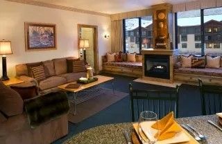 image Relax and unwind in the cozy, well-appointed living room.