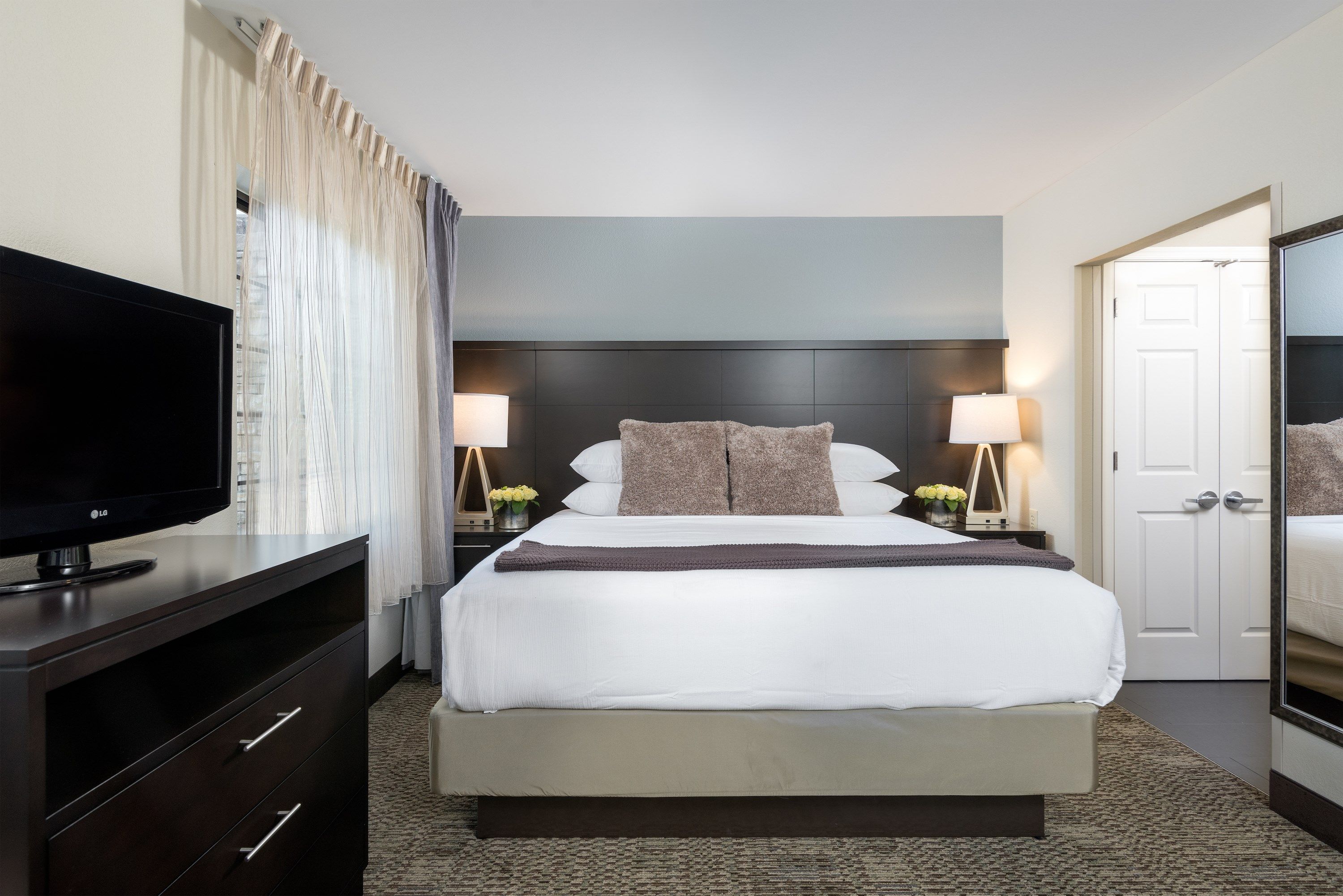 image Drift to sleep in a comfortable bed after a wonderful day outside.