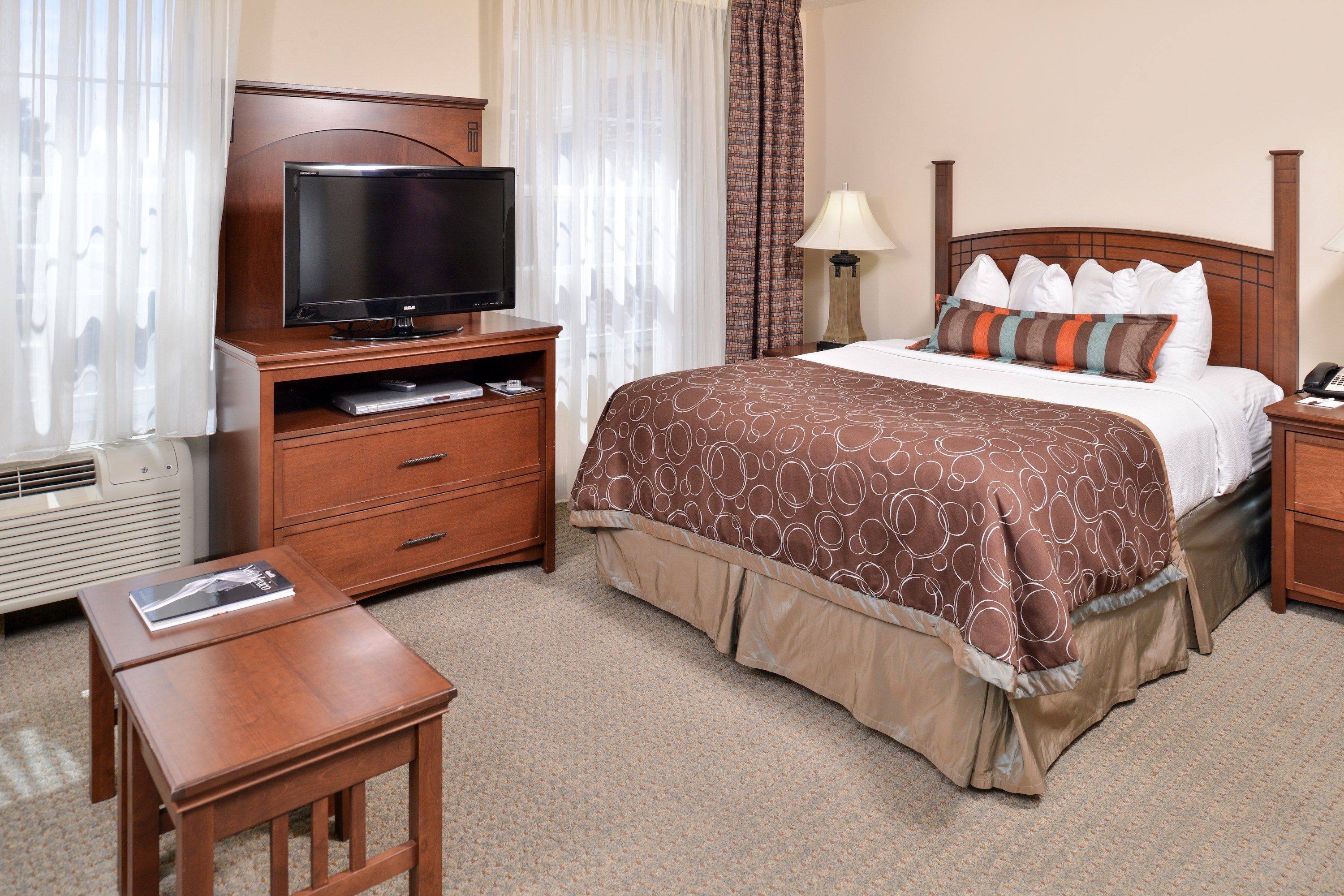 image Drift to sleep in a comfortable bed after a wonderful day outside.