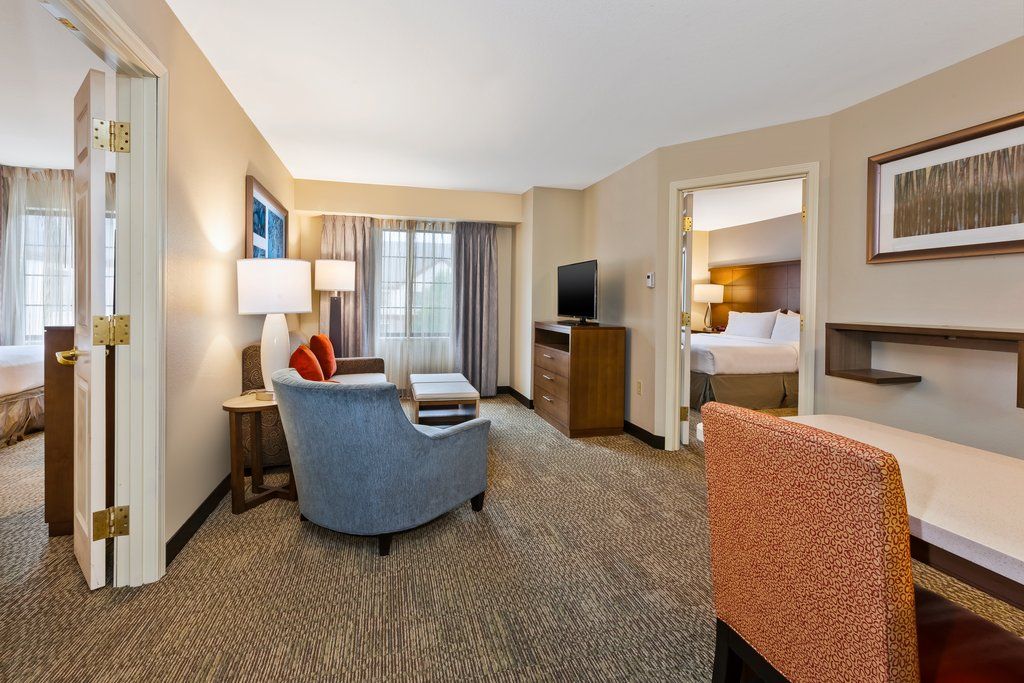 image Unwind in the spacious living area, perfect for enjoying a movie or a good book