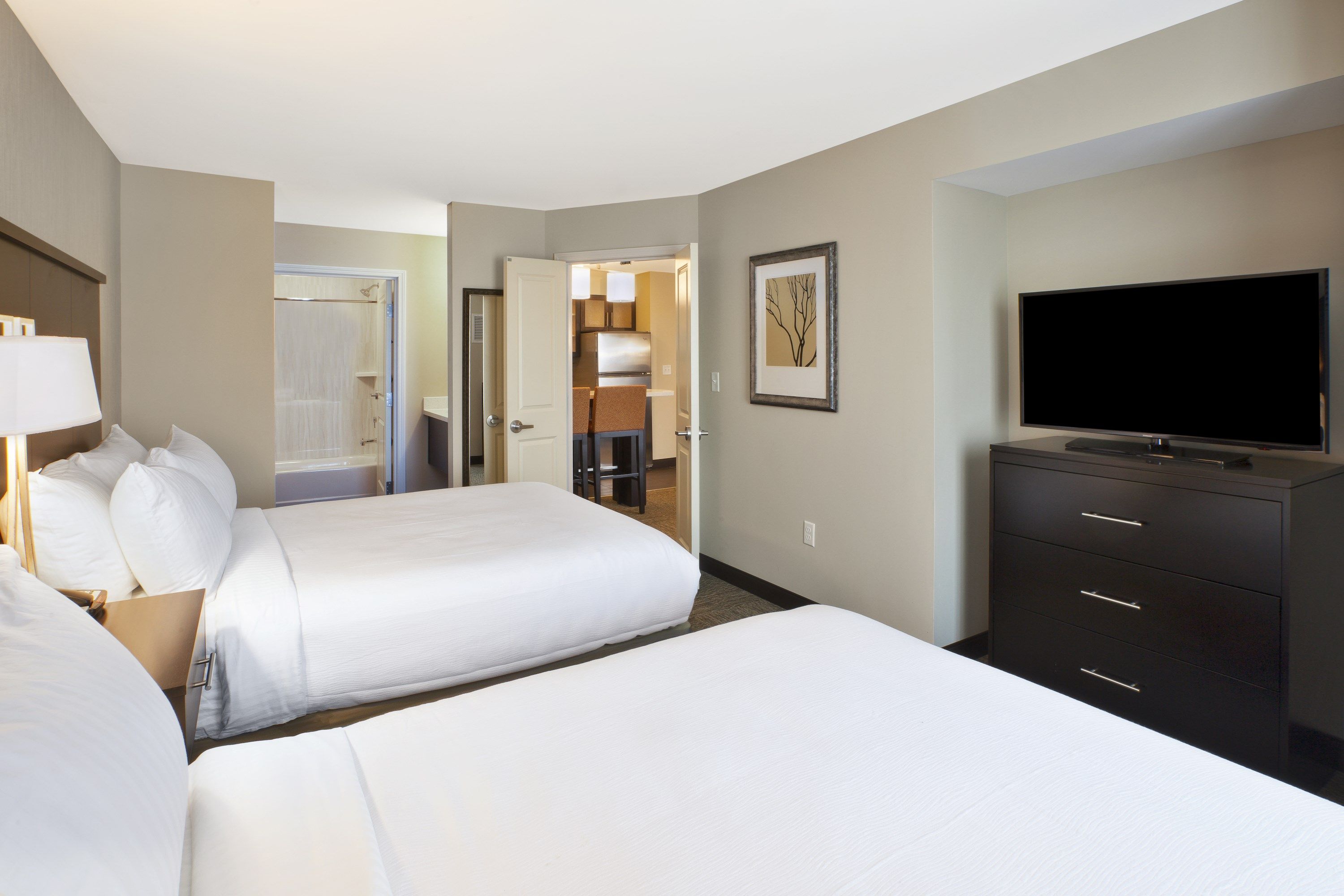 image Drift to sleep in a comfortable bed after a wonderful day outside.