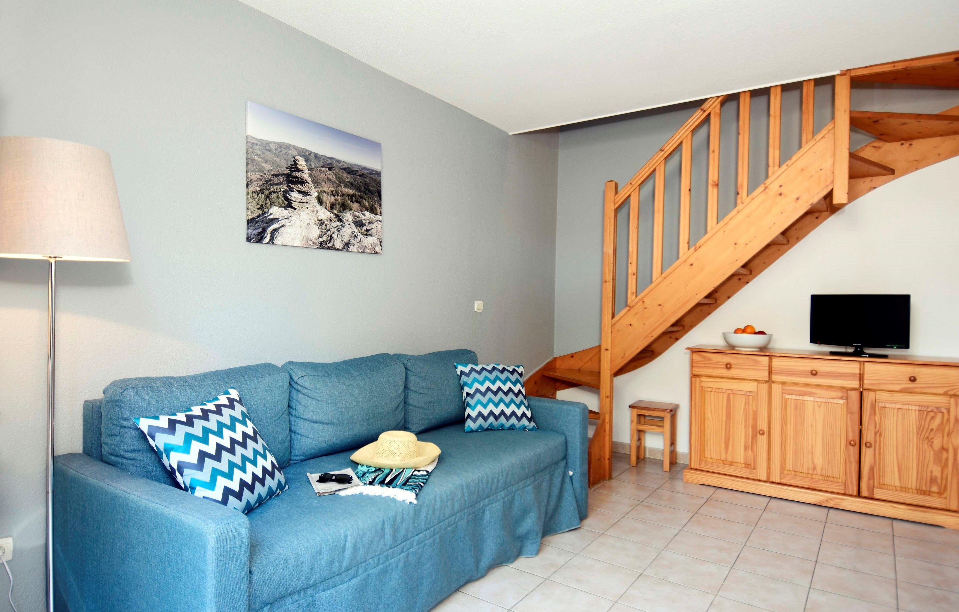 image Snuggle up with a cup of coffee or tea on the comfortable sofa.