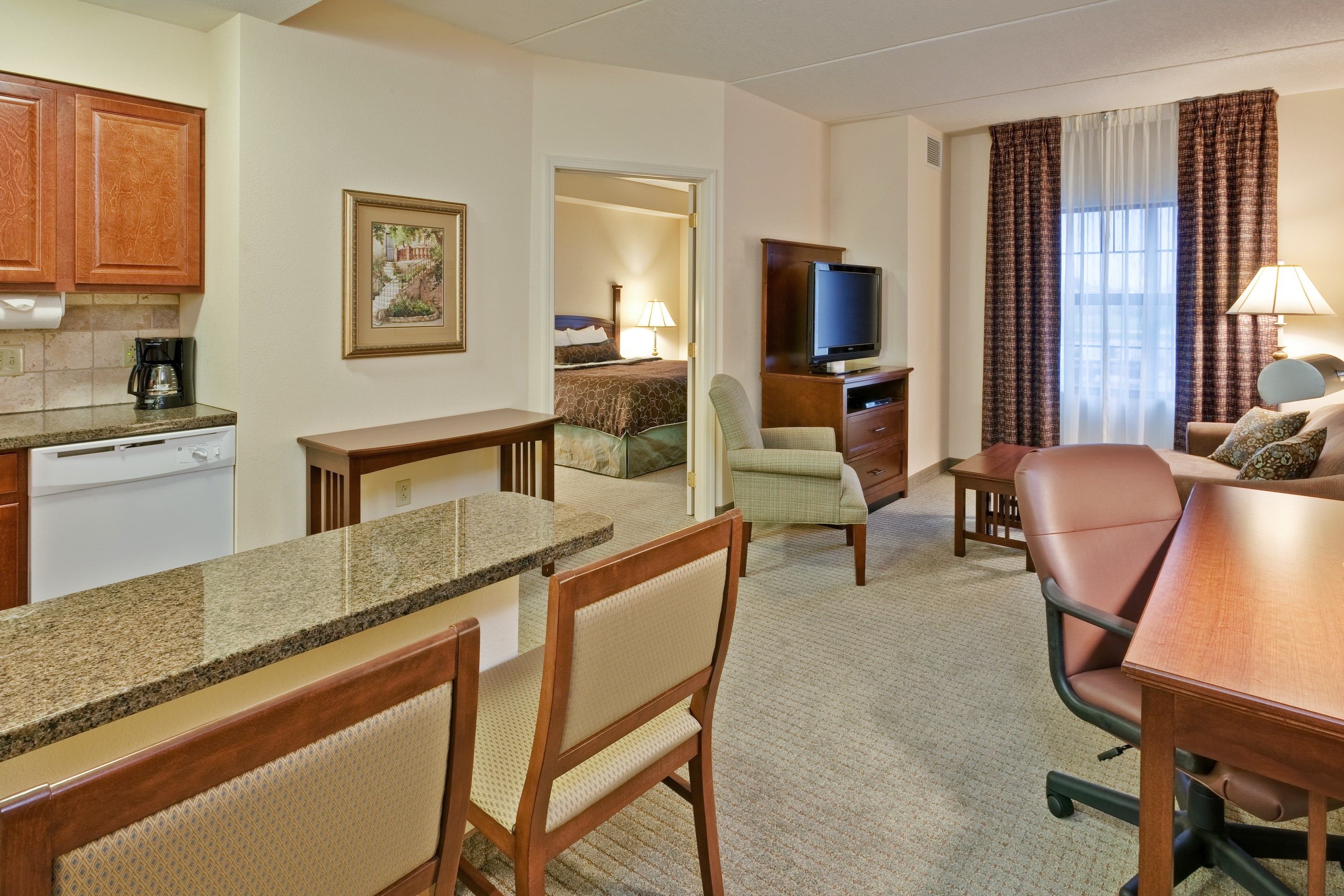 image Settle into the dining area and enjoy a nice meal.