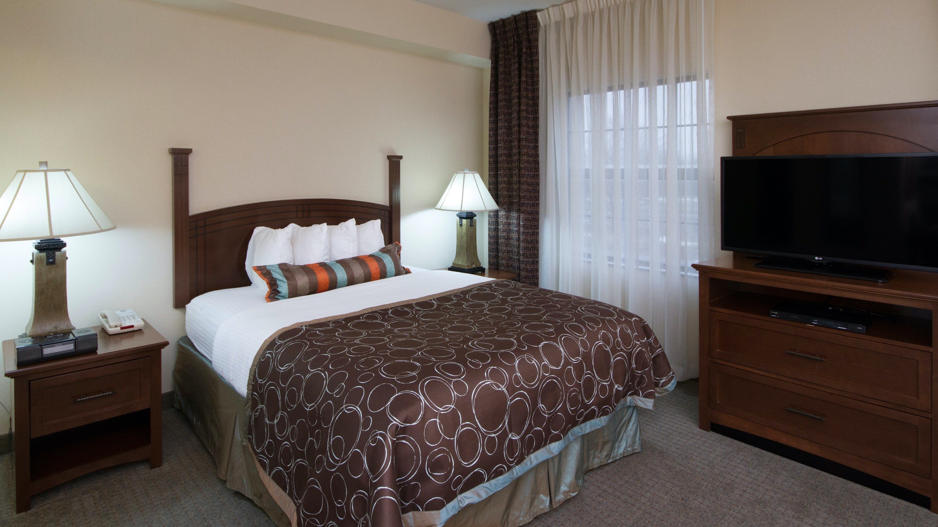 image Drift to sleep in a comfortable bed after a wonderful day outside.