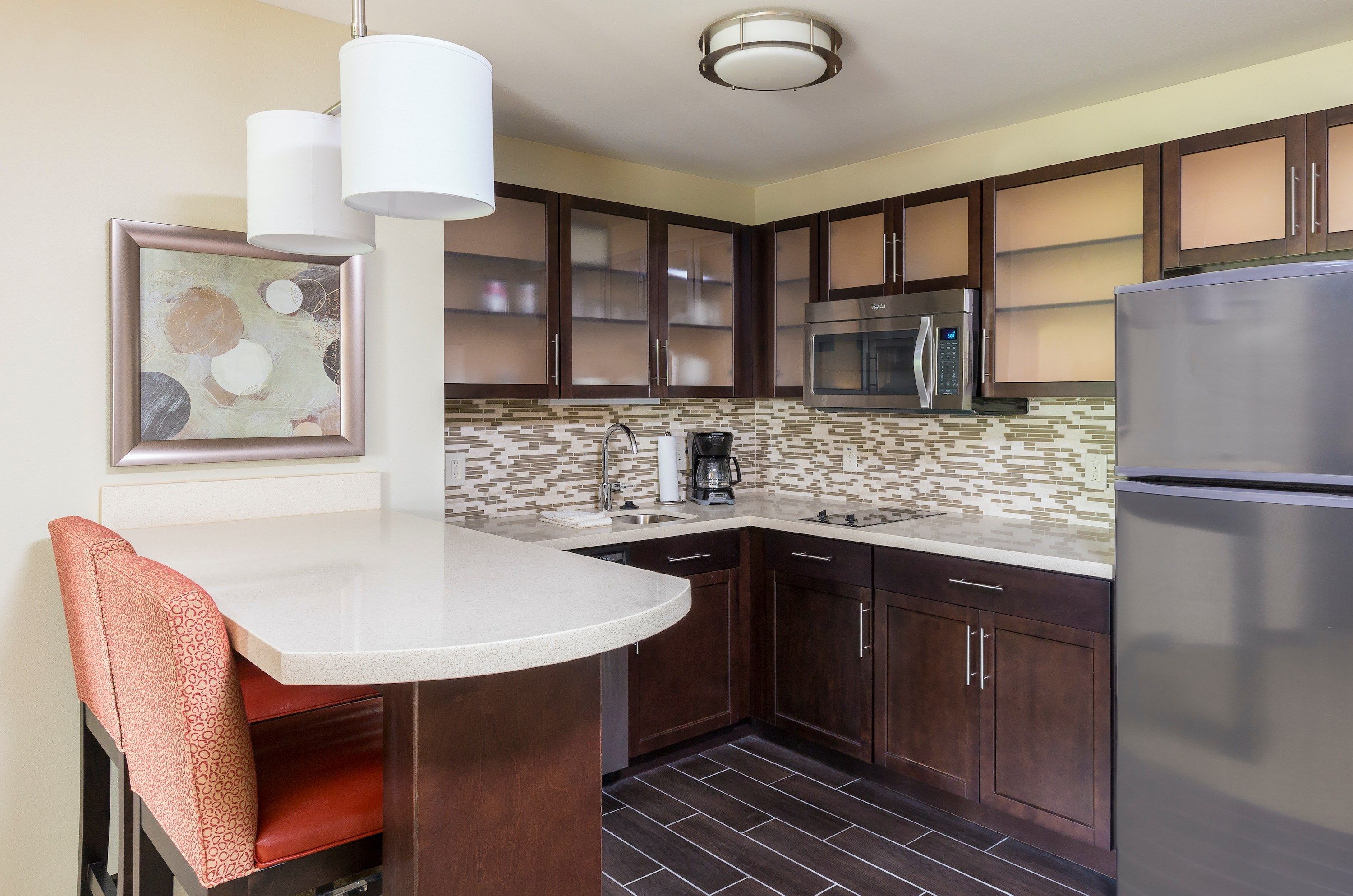 image Curb your appetite by indulging on a snack in your kitchenette!