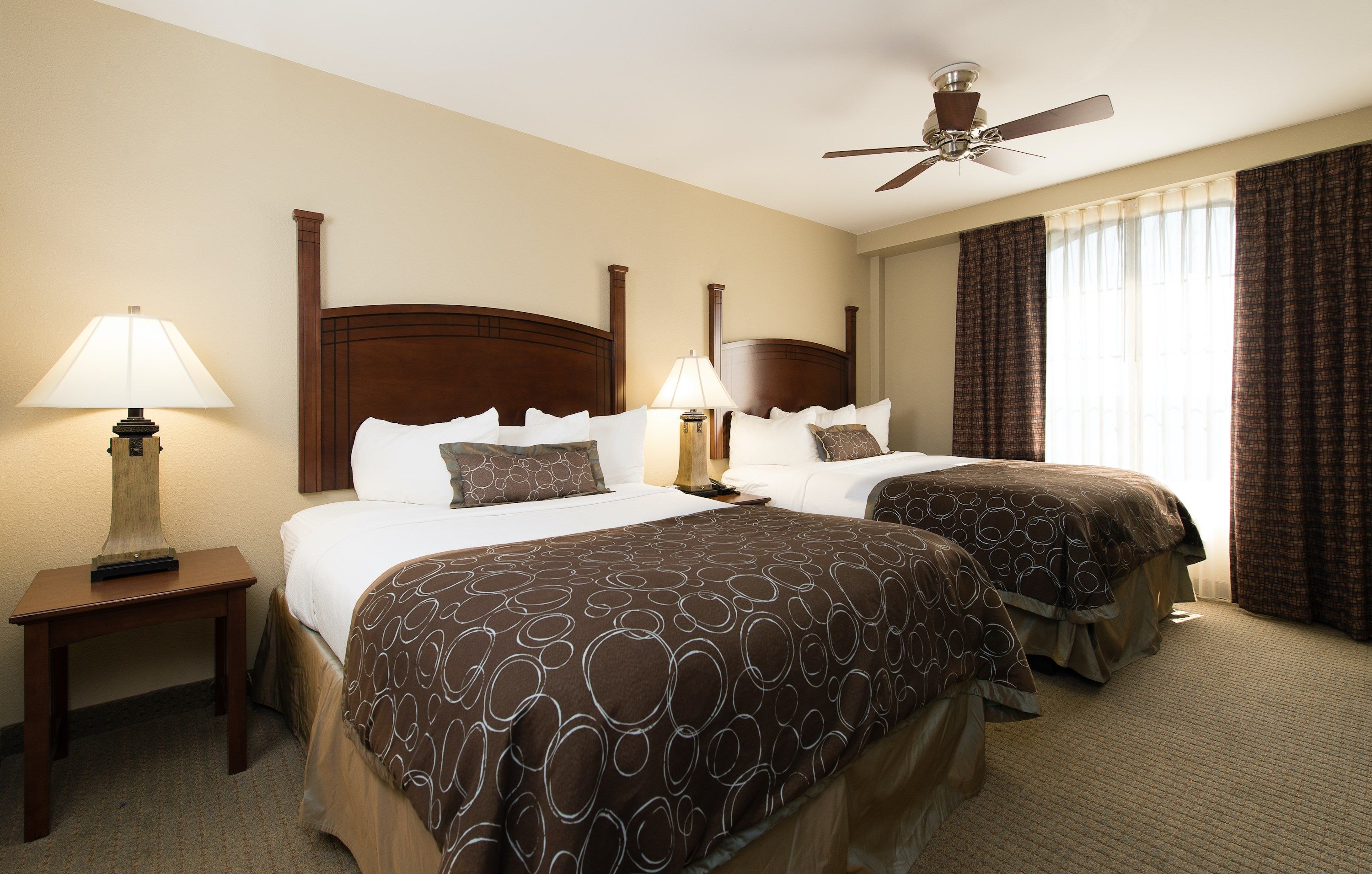 image Drift to sleep in a comfortable bed after a wonderful day outside.