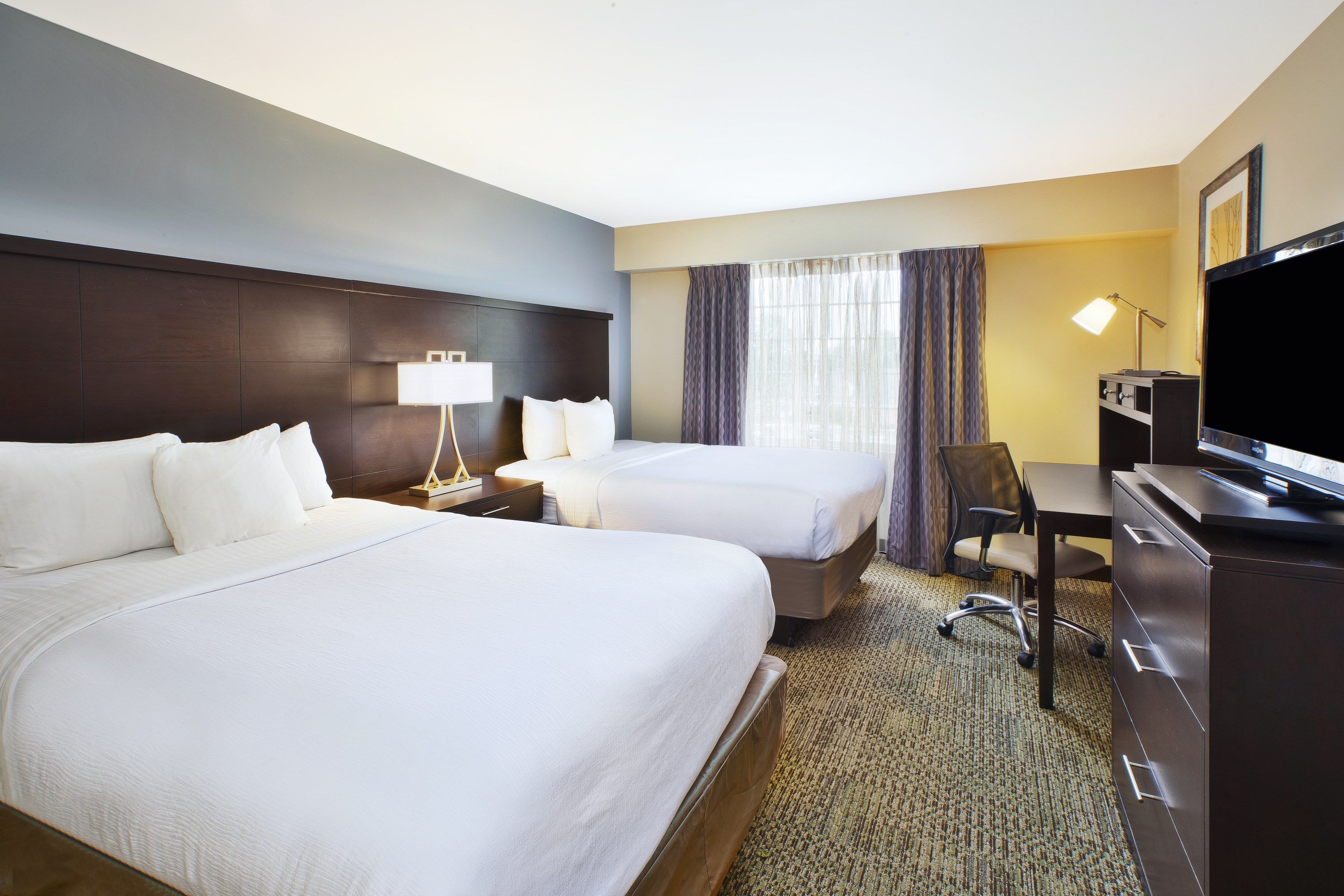 image Drift to sleep in a comfortable bed after a wonderful day outside.