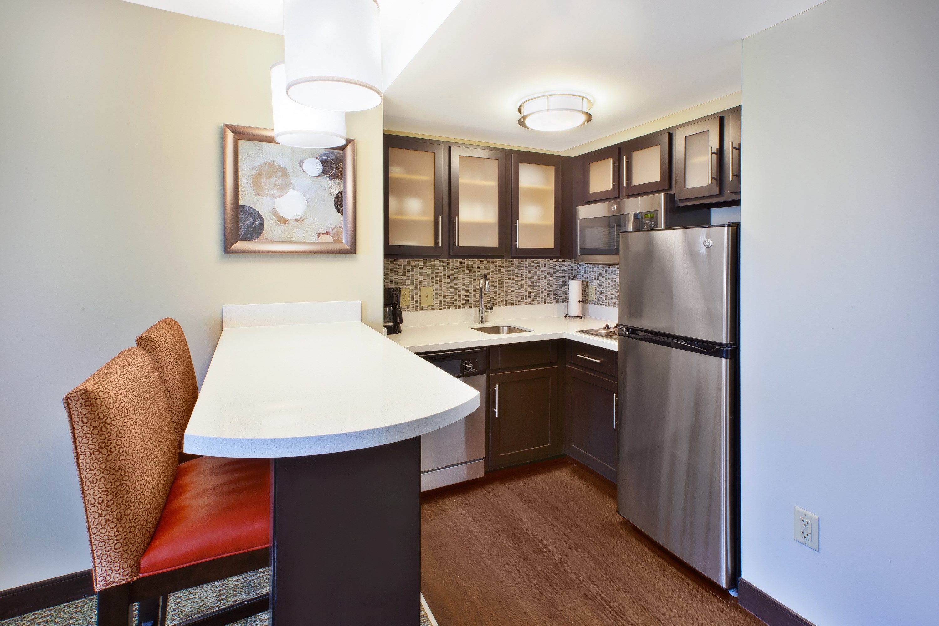 image Curb your appetite by indulging on a snack in your kitchenette!