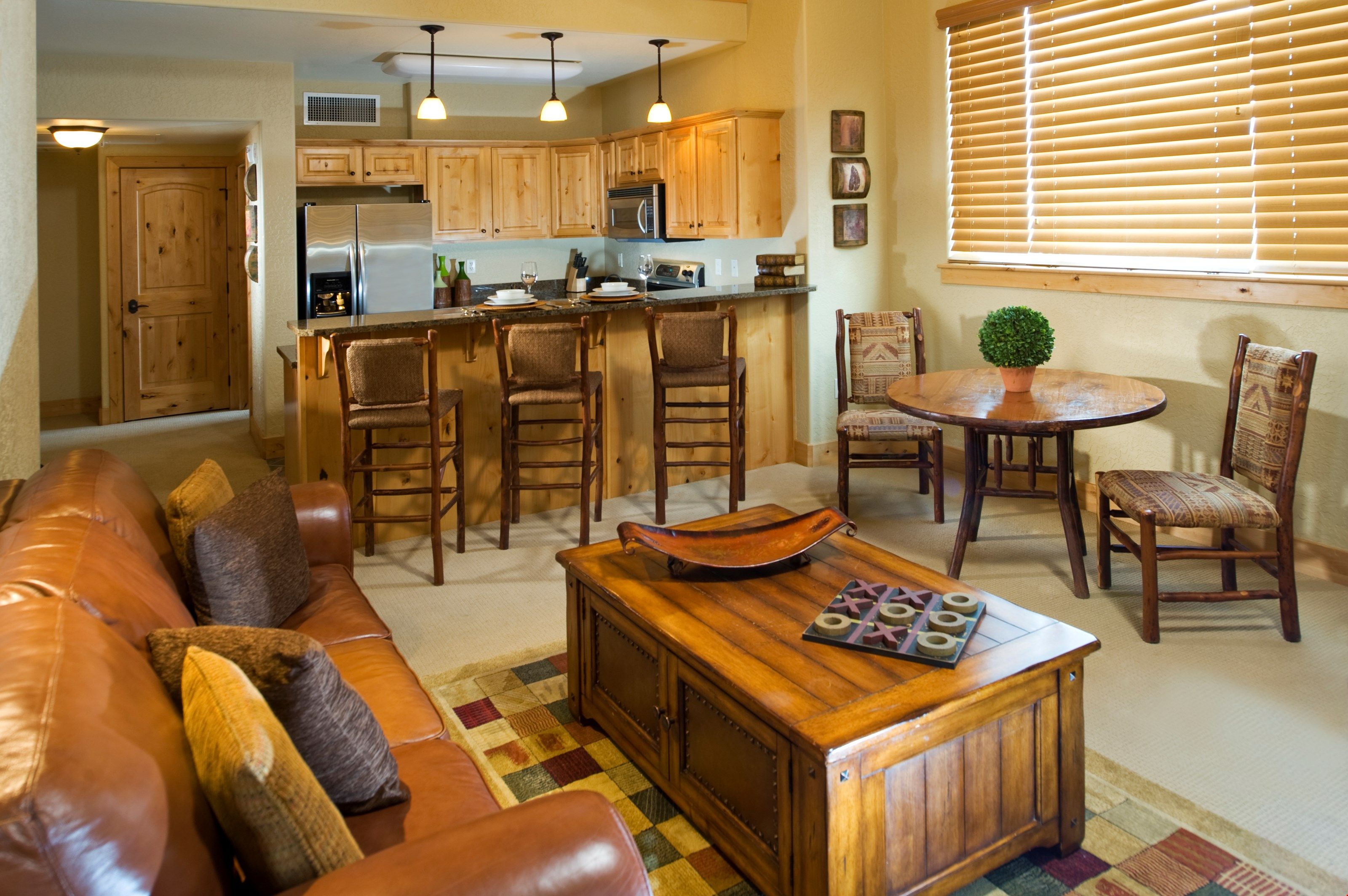image Kick up your feet and relax in the cozy living room.
