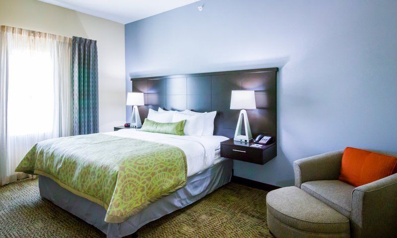 image King bed with armchair and lamp