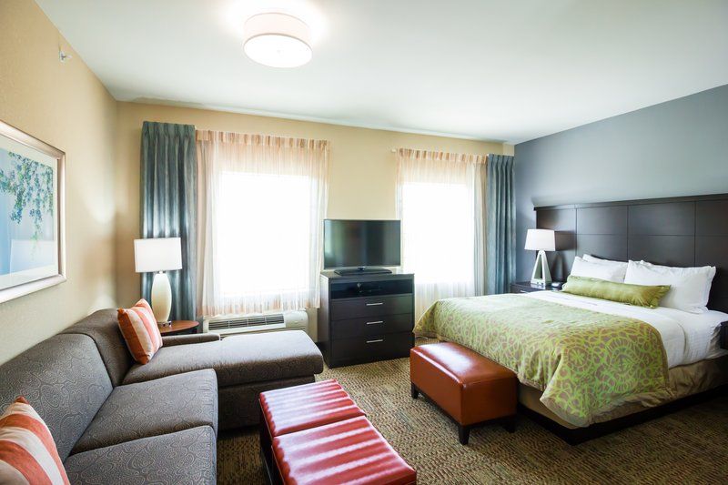 image King bed with nightstands and seating area