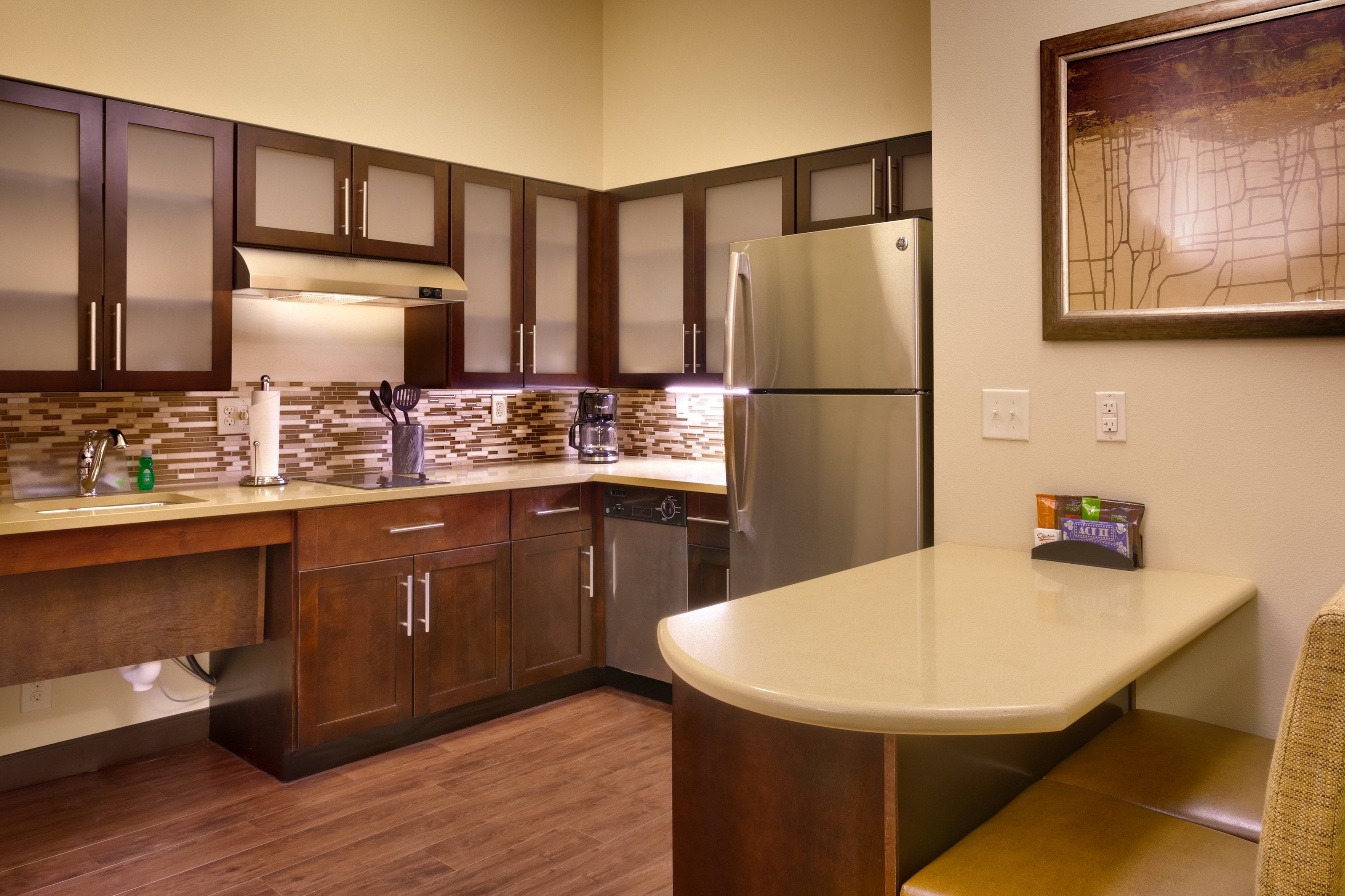 image Curb your appetite by cooking a meal in your kitchen.
