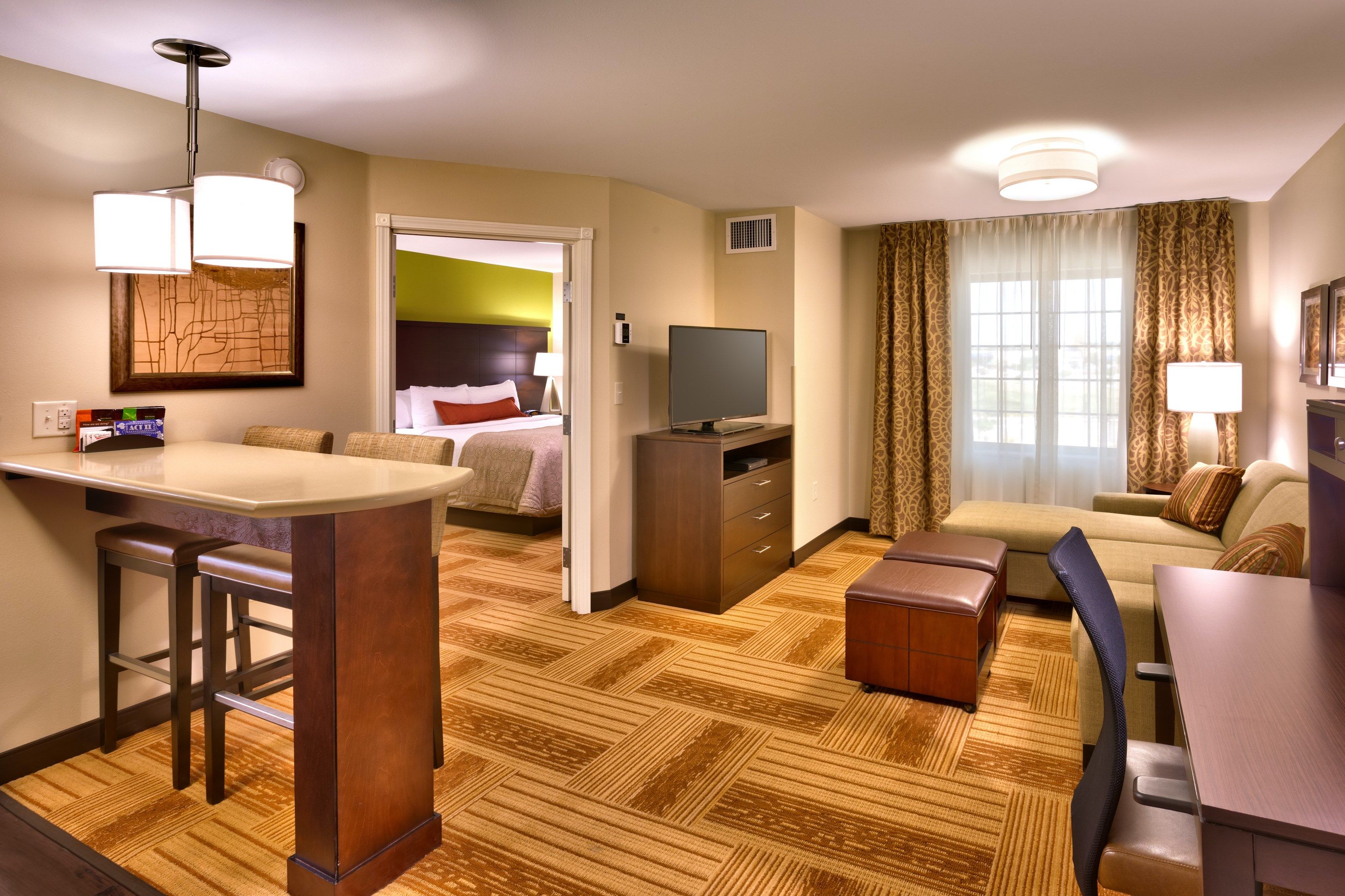 image Enjoy the warm and cozy decor in our accessible suite!