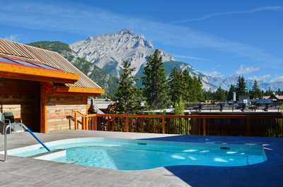 Soak in the shared outdoor hot tub!