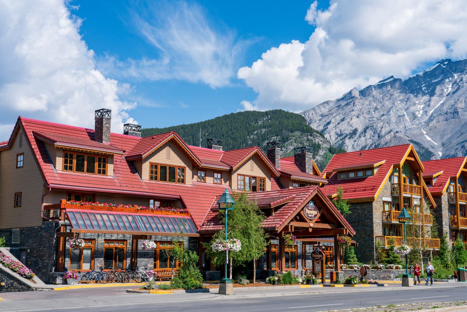 image Stroll down Banff Ave with its scenic mountain backdrop.