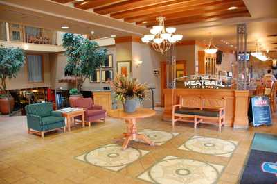 Bordering the famous Meatball Pizza and Pasta restaurant, have a drink in the lobby before dinner.