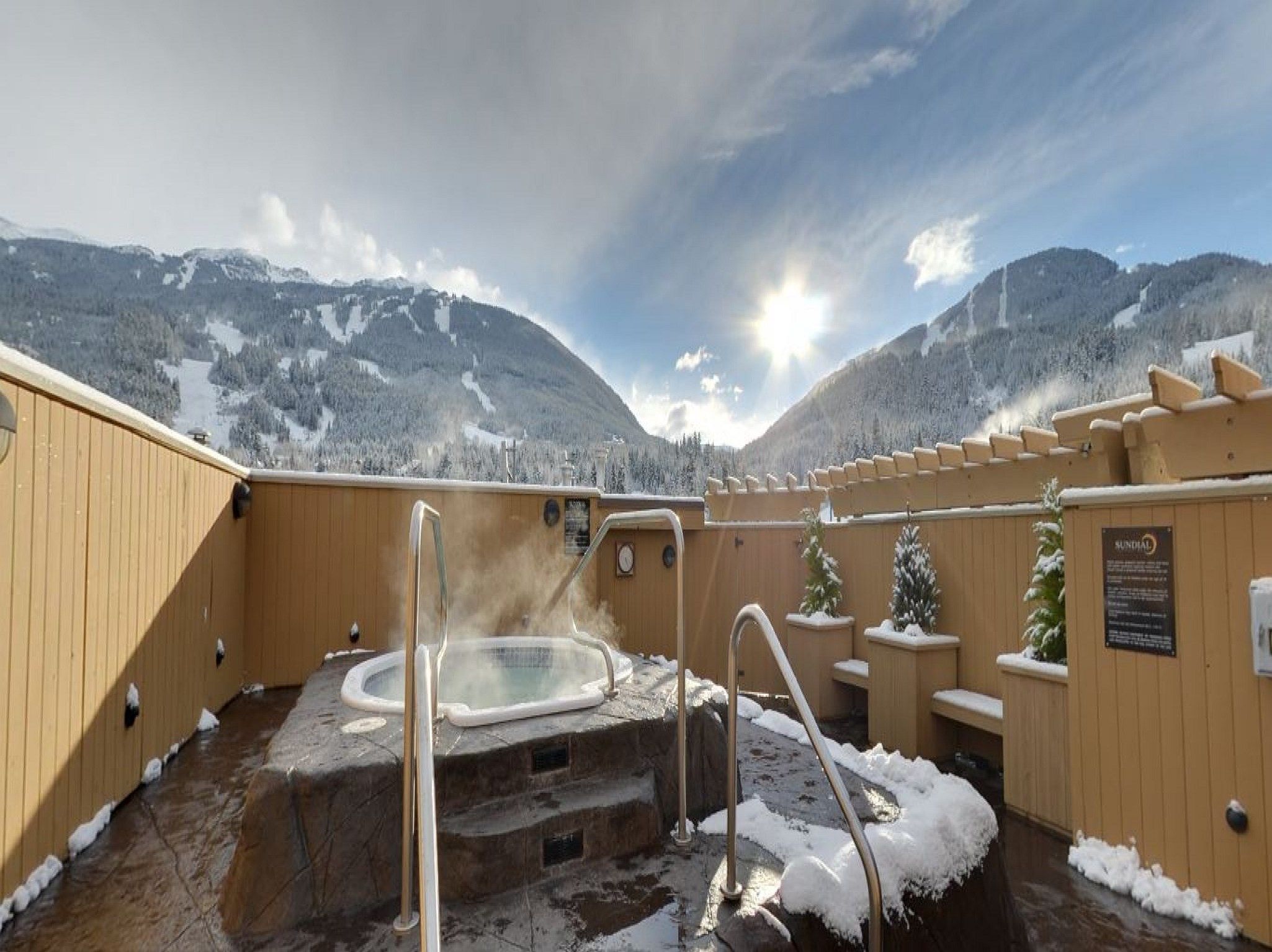 image Soak in the hot tub surrounded by spectacular mountain views