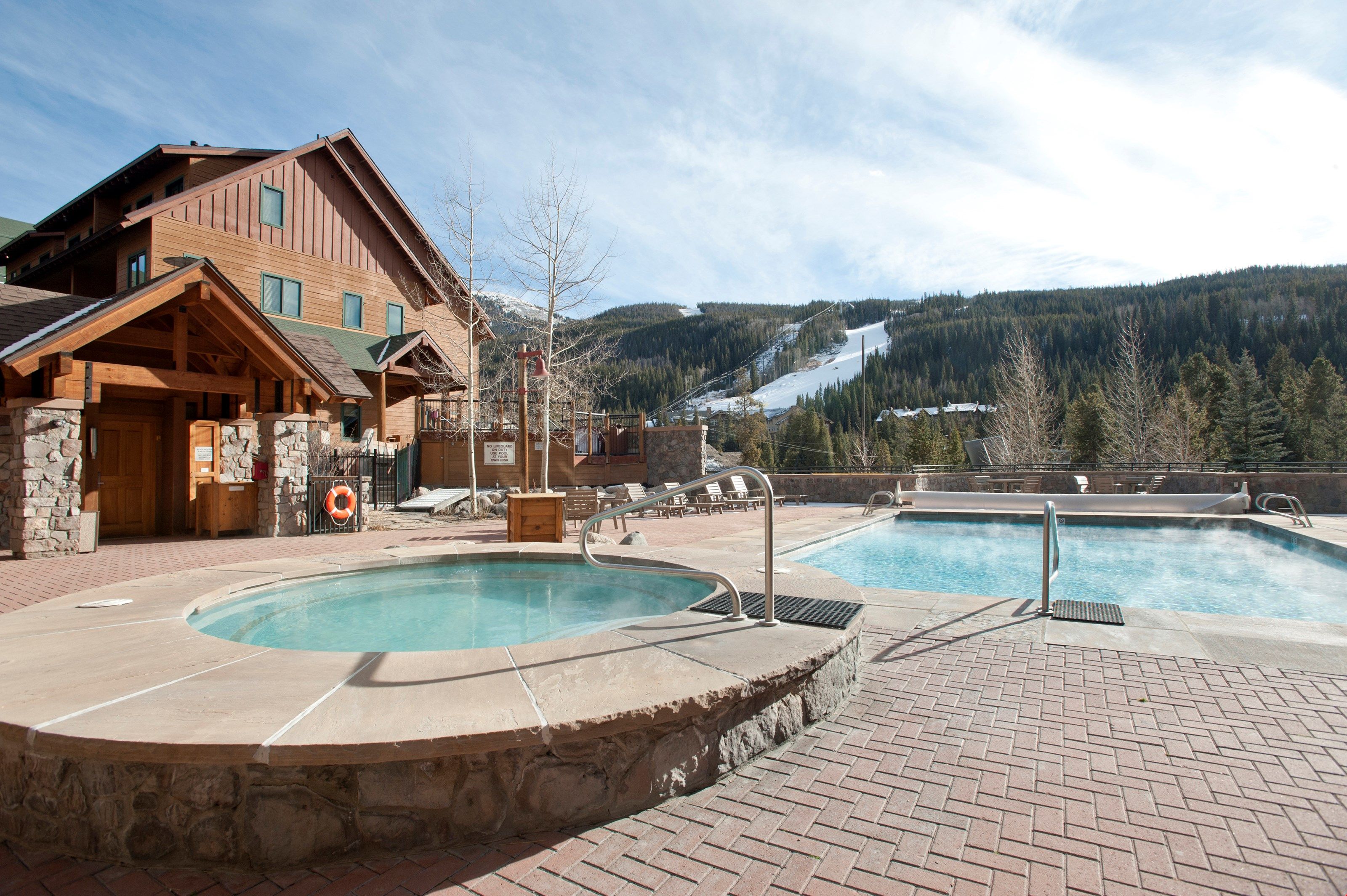 image Take a dip in the outdoor hot tub and enjoy mountain views.