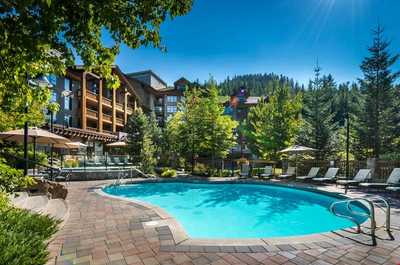 Take a dip in the luxurious outdoor pool.