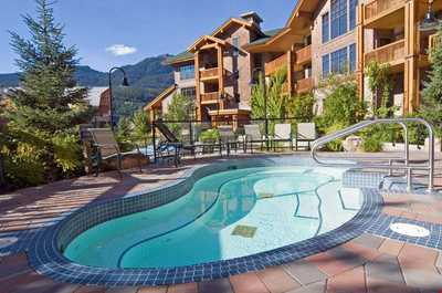 Enjoy a dip in the outdoor pool while taking in the gorgeous surrounding views.