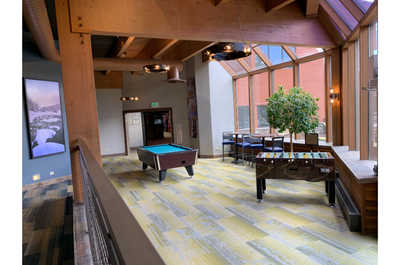 Bask in the charm of our wooden guest lounge, a serene spot for relaxation and conversation.