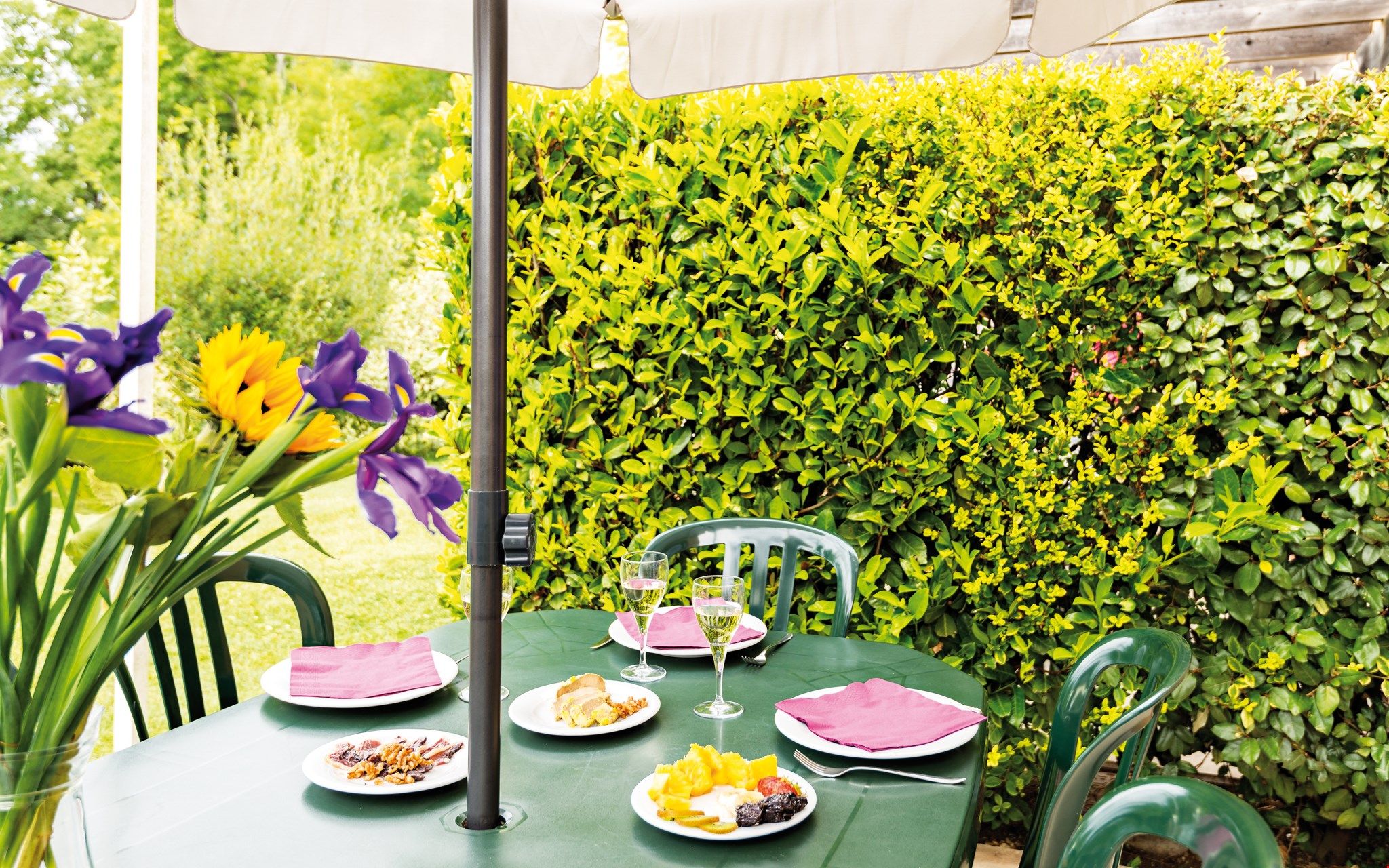 image Enjoy reminiscing about your day while sipping a glass of wine outside on the patio.