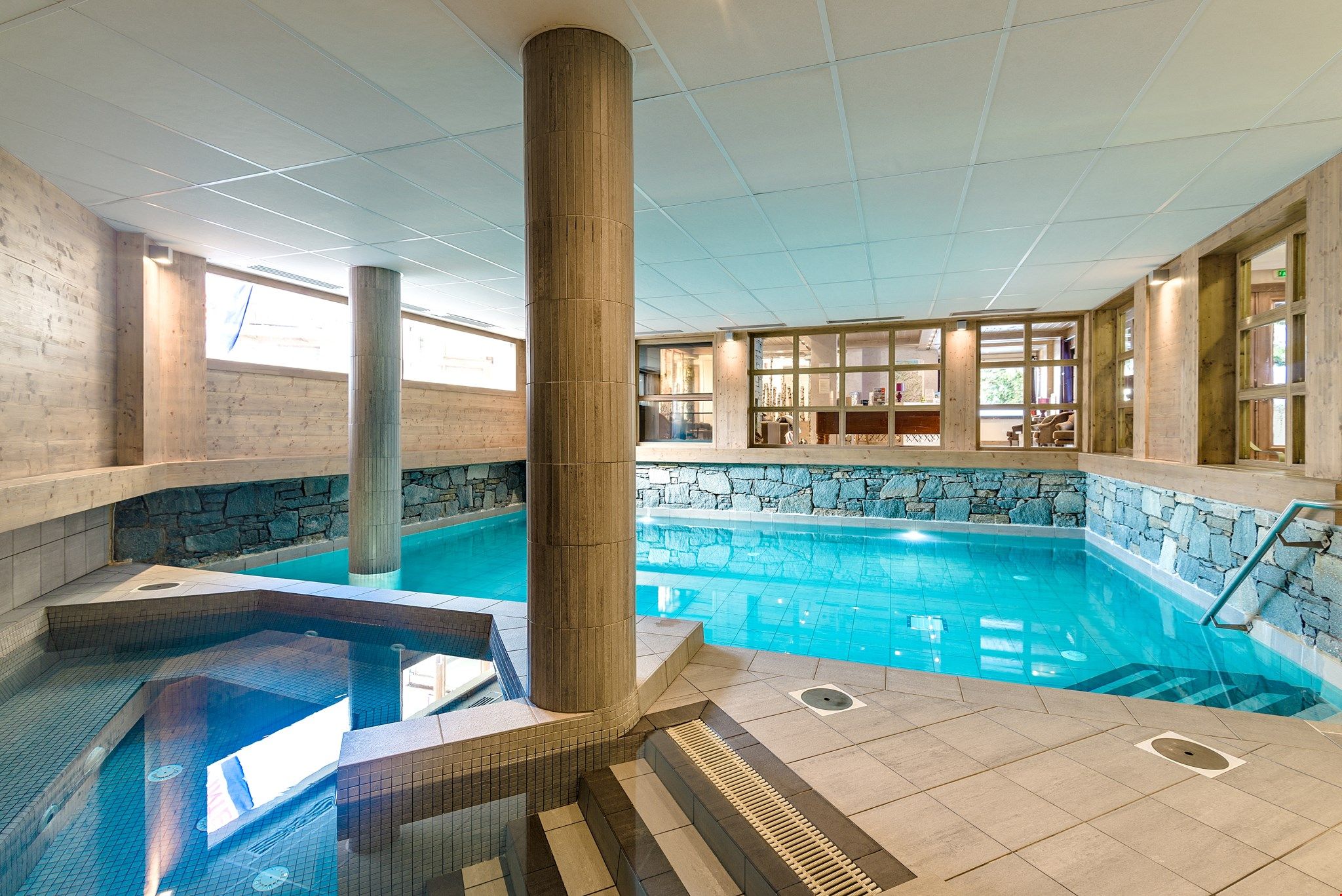 image Dive into the lovely indoor pool after a great day!