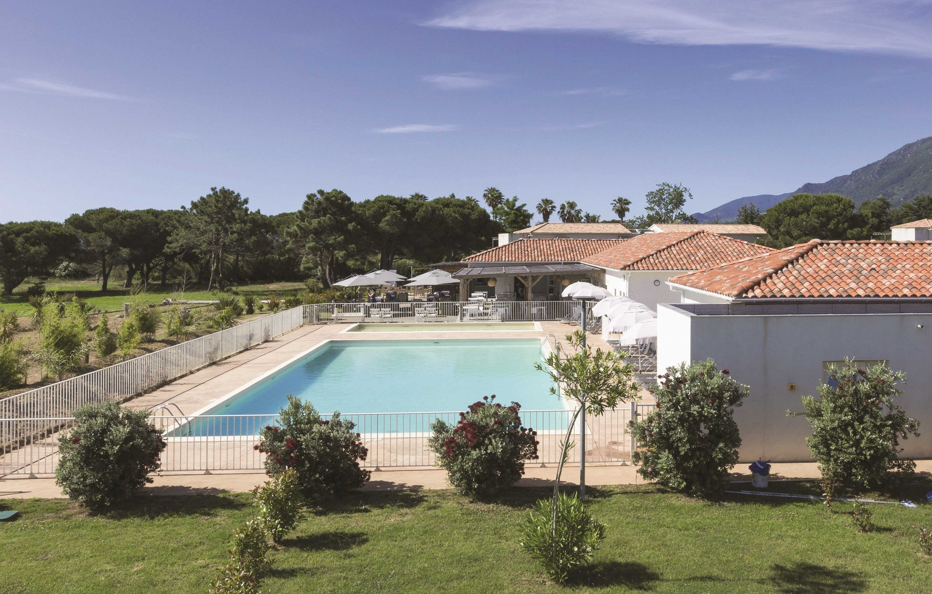 image Take in gorgeous views while lounging around the on-site outdoor pool.