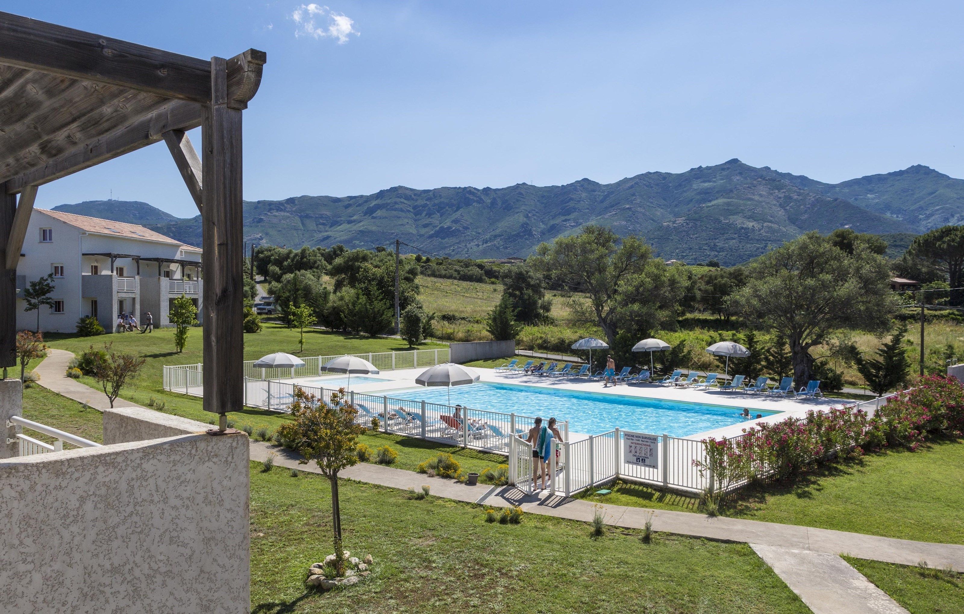 image Dive into the lovely outdoor pool during the summer.