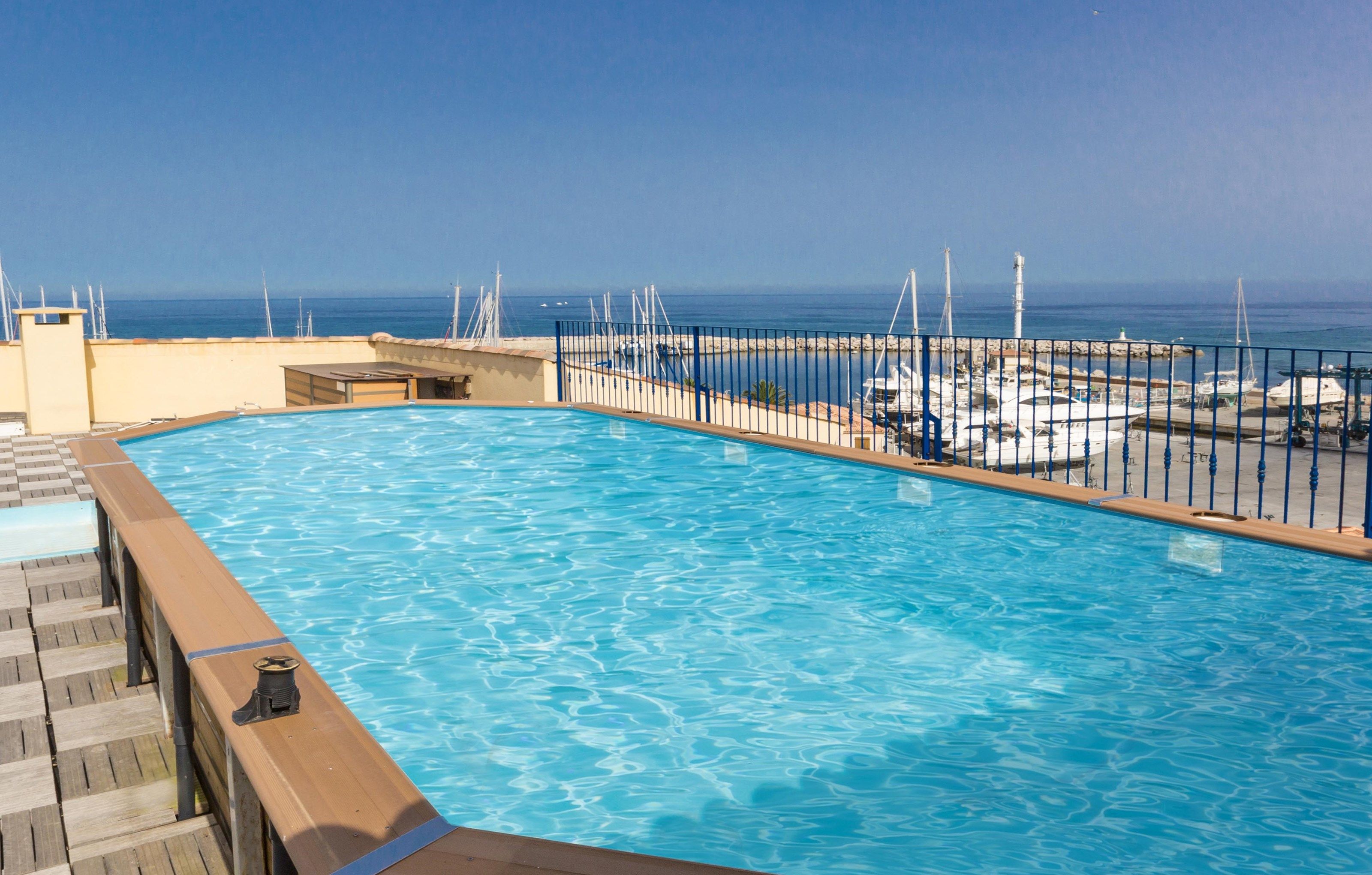 image Take in gorgeous views while lounging around the on-site outdoor pool.