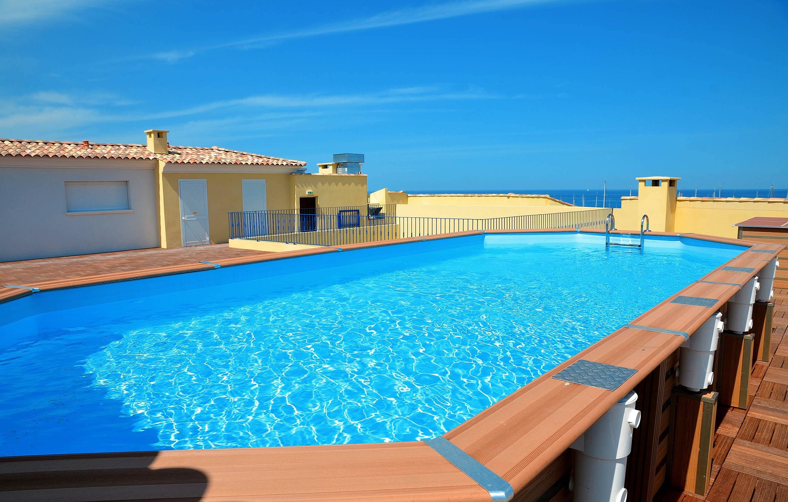 image Take a refreshing dip in the stunning rooftop pool