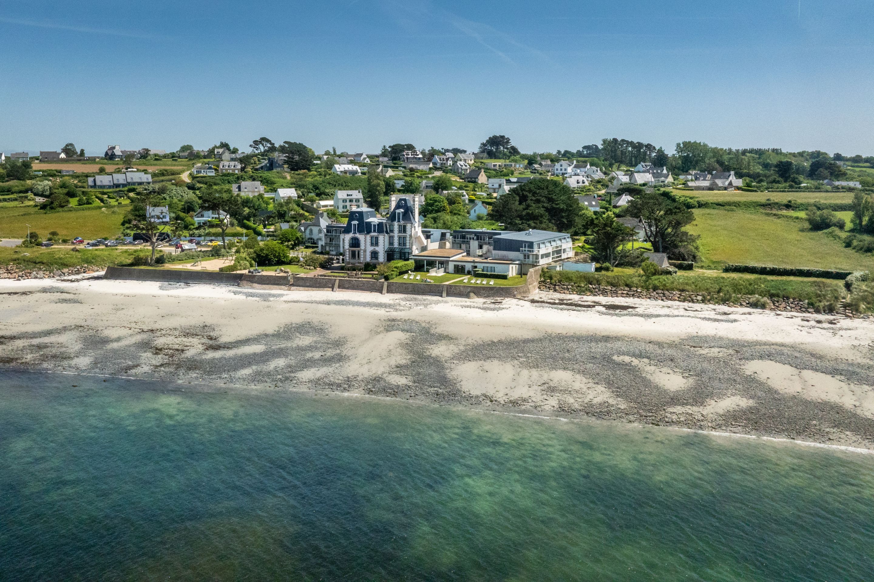 image The beach sits right at the edge of the grounds, with the Breton hillside rising behind.