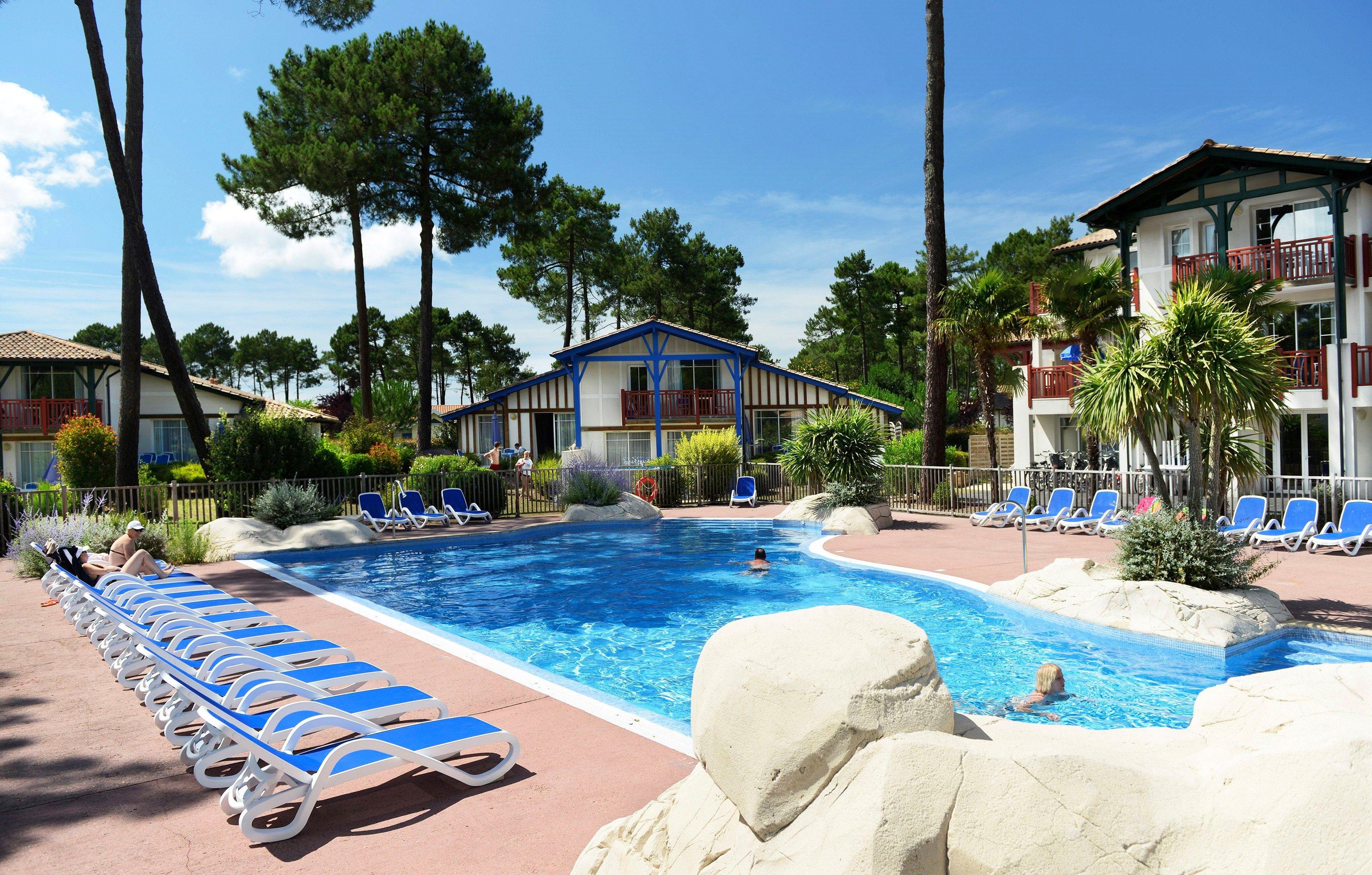 image Lounge in the sunshine around the pool.
