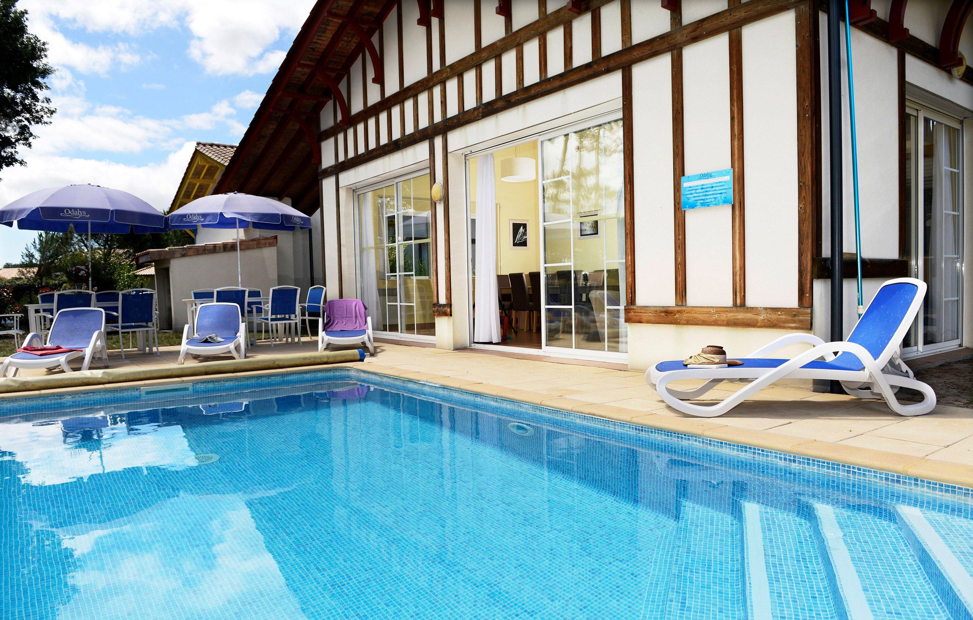 image Take a dip in the shared outdoor pool.