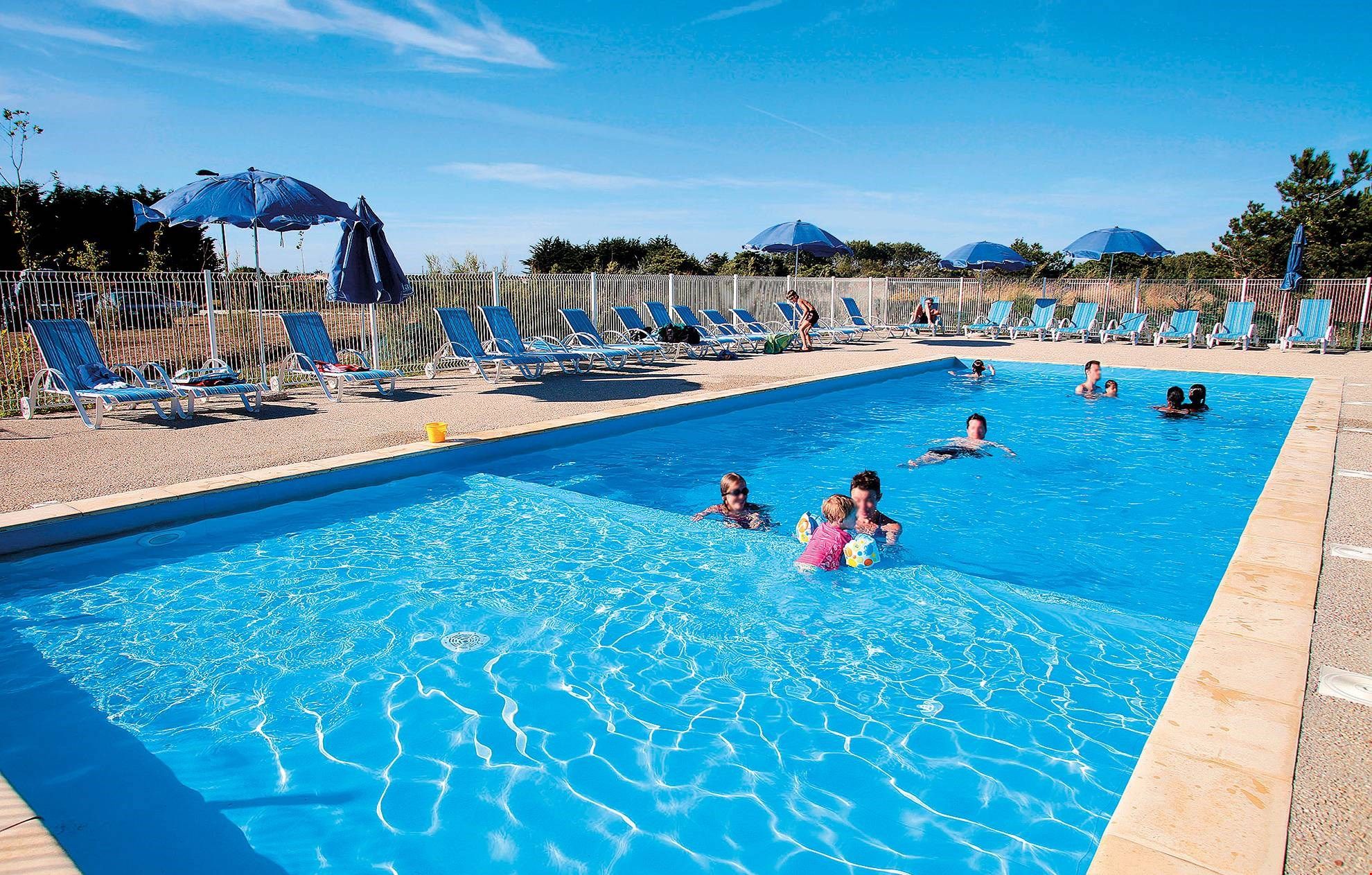 image Enjoy table tennis, a sports ground, a heated outdoor pool and more at this residence.
