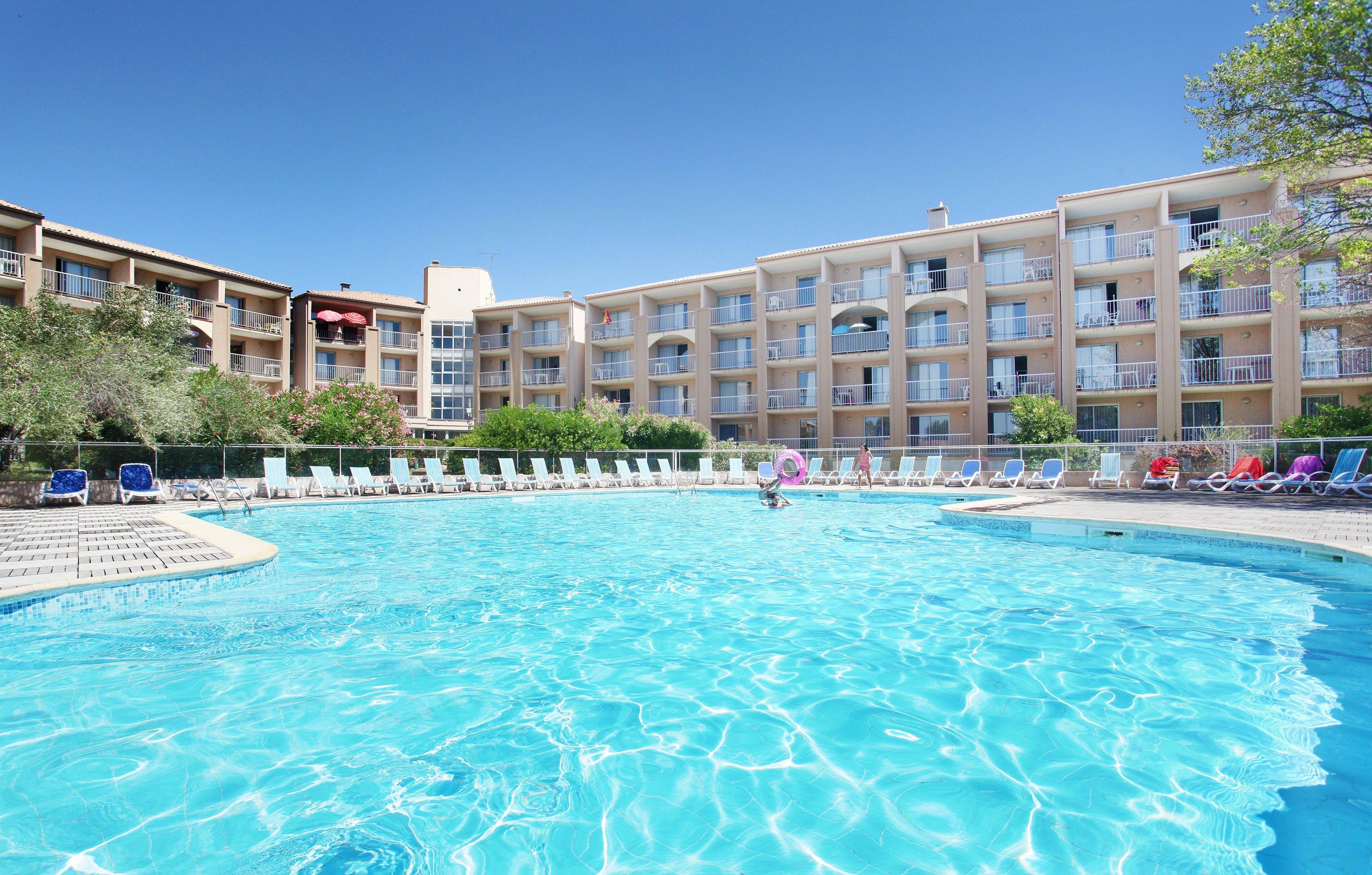 image Take in gorgeous views while lounging around the on-site outdoor pool.