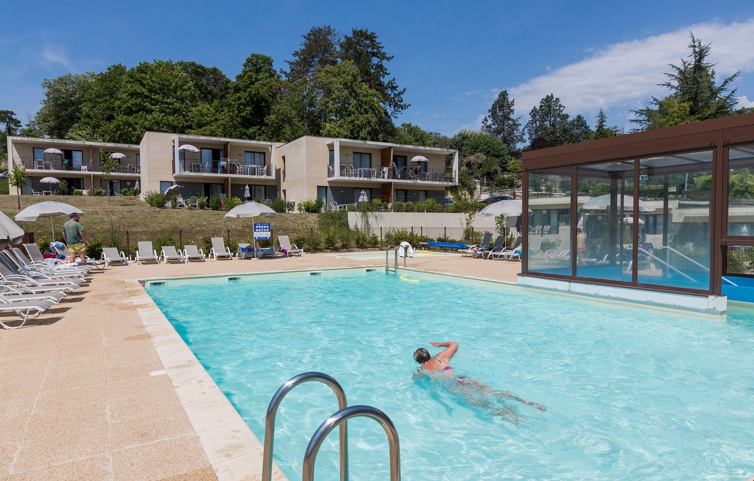 image Take a refreshing and cool dip in the beautiful outdoor pool.