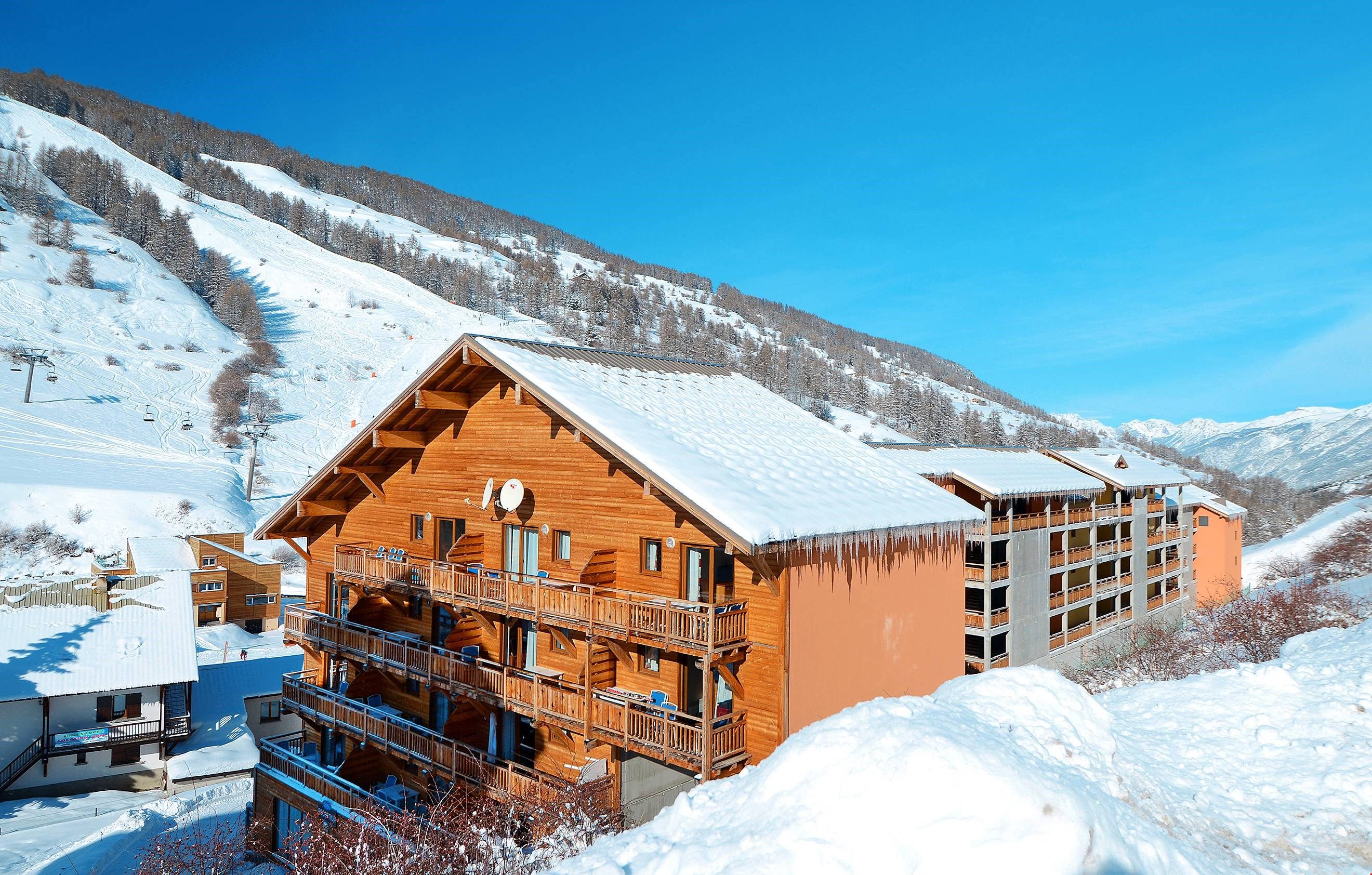 image Enjoy close access to the ski hill from the charming wood buildings of the resort.