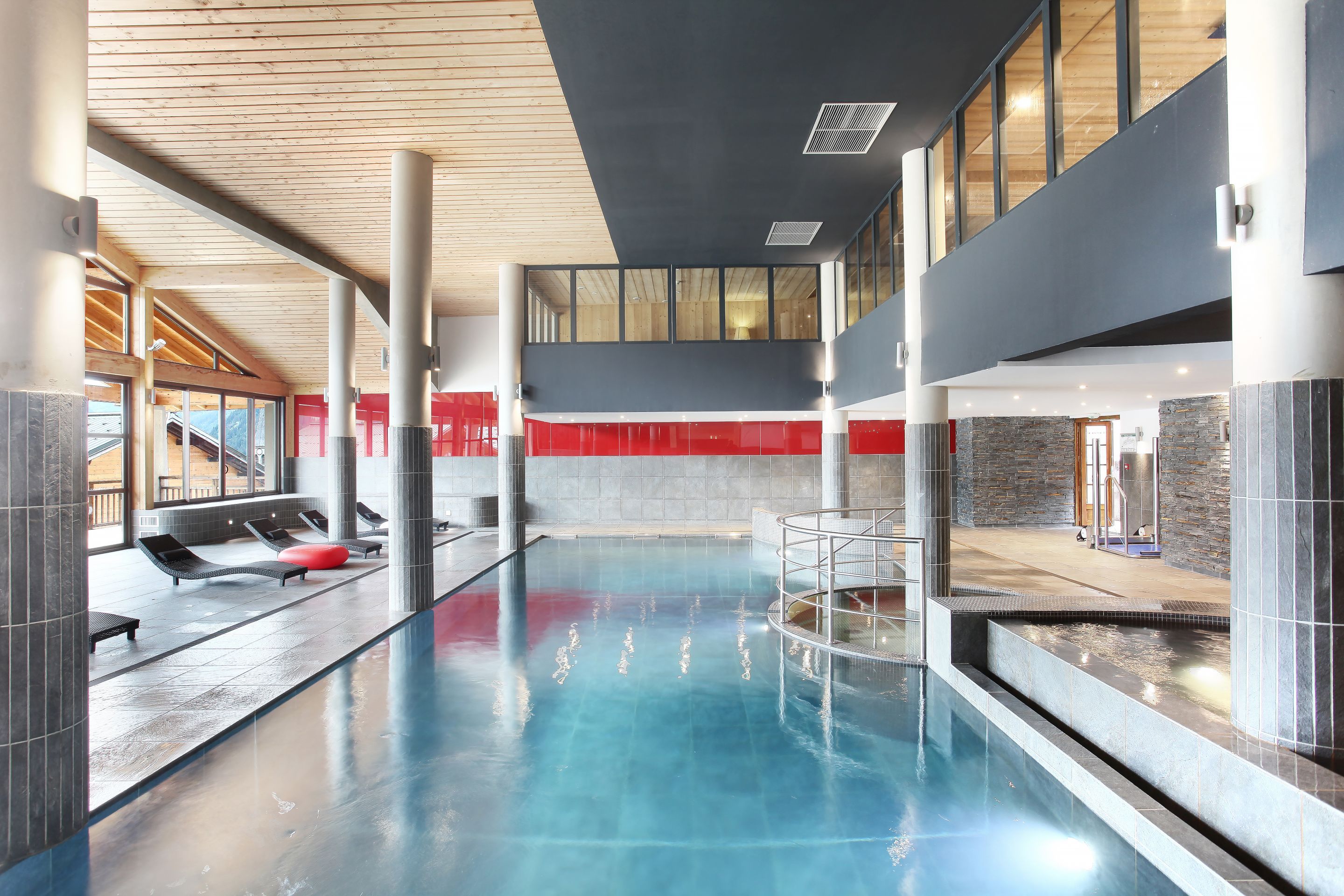 image A hydrotherapy spa sits alongside the pool, offering a proper apres-ski unwind after a day tackling the Portes du Soleil's 316 pistes.