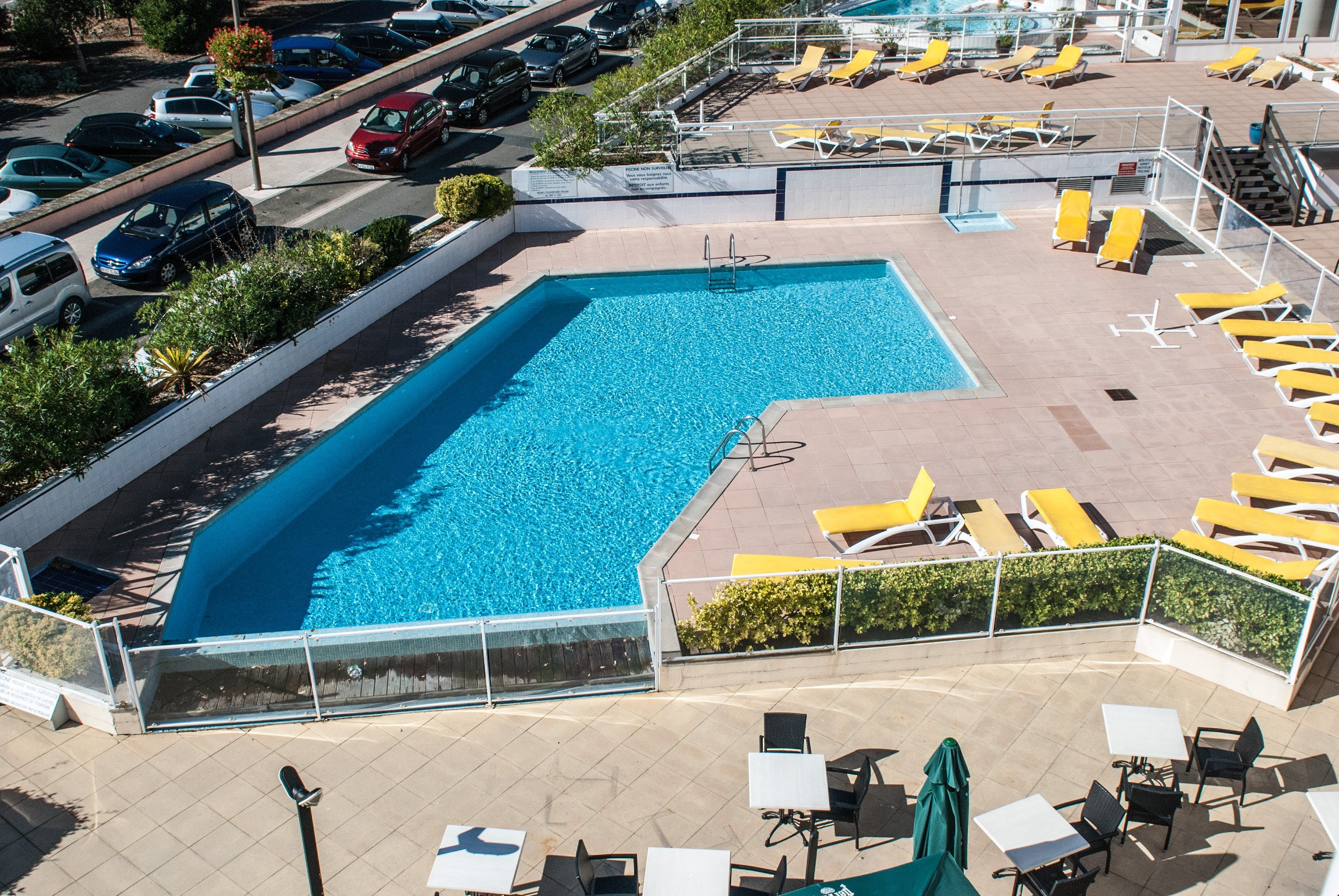 image The outdoor pool is the perfect place to share some laughs with friends and family