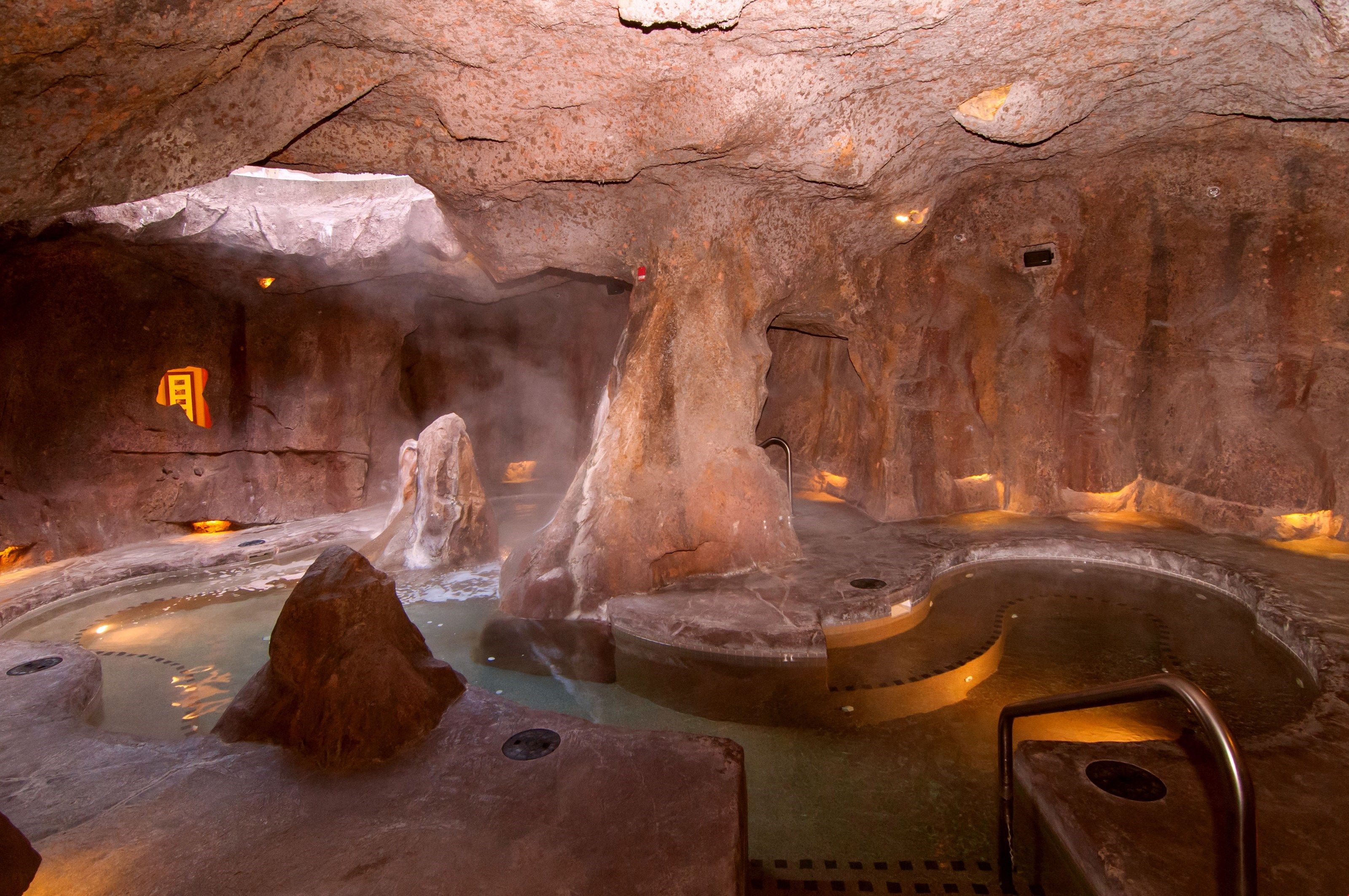 image Experience luxury in the grotto pools.