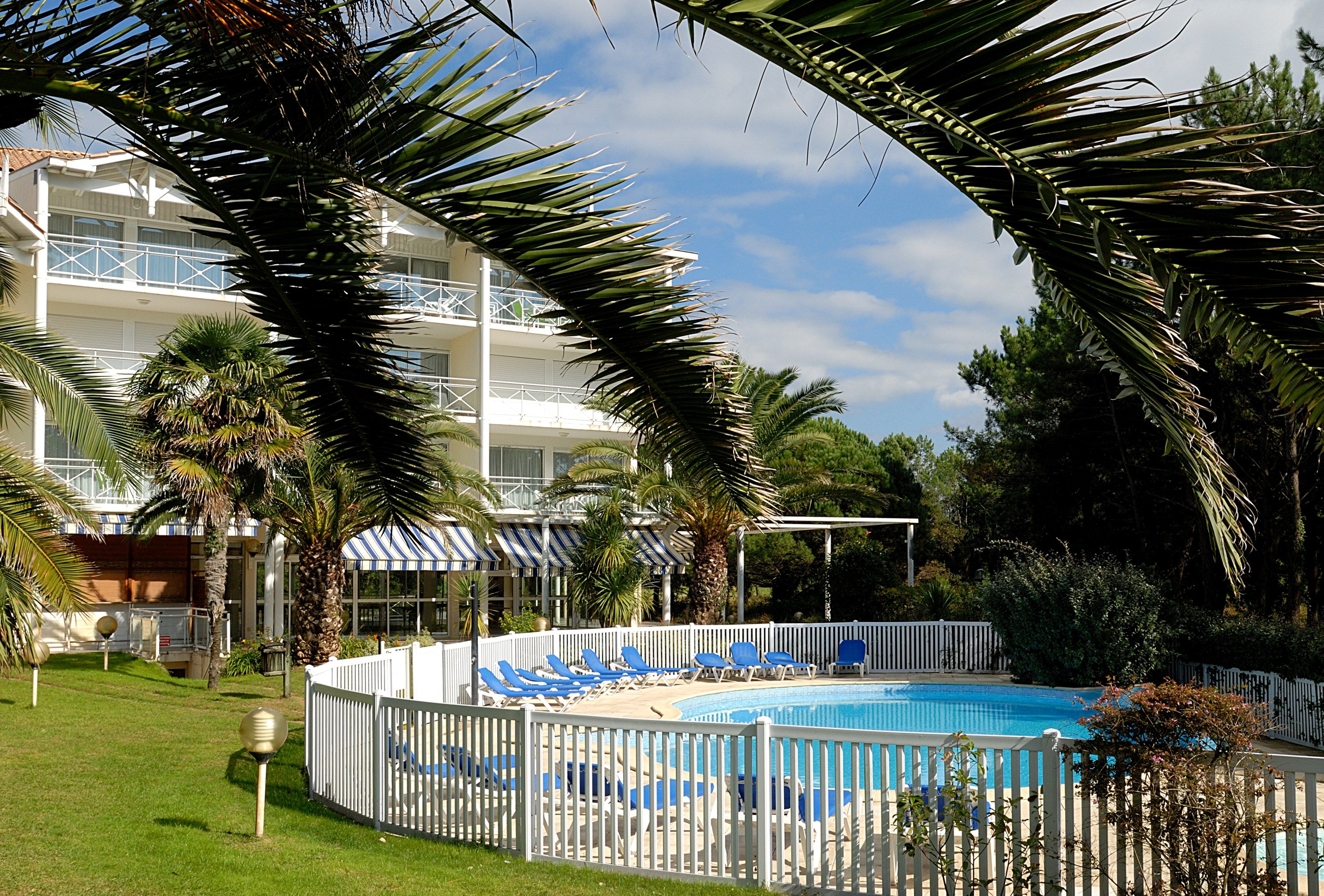 image Dive into the lovely outdoor pool during the summer.