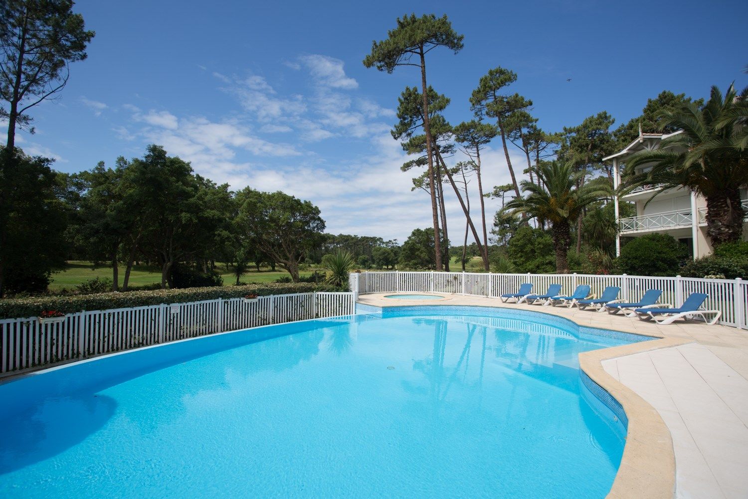 image Take a quick dip in the shared seasonal pool.
