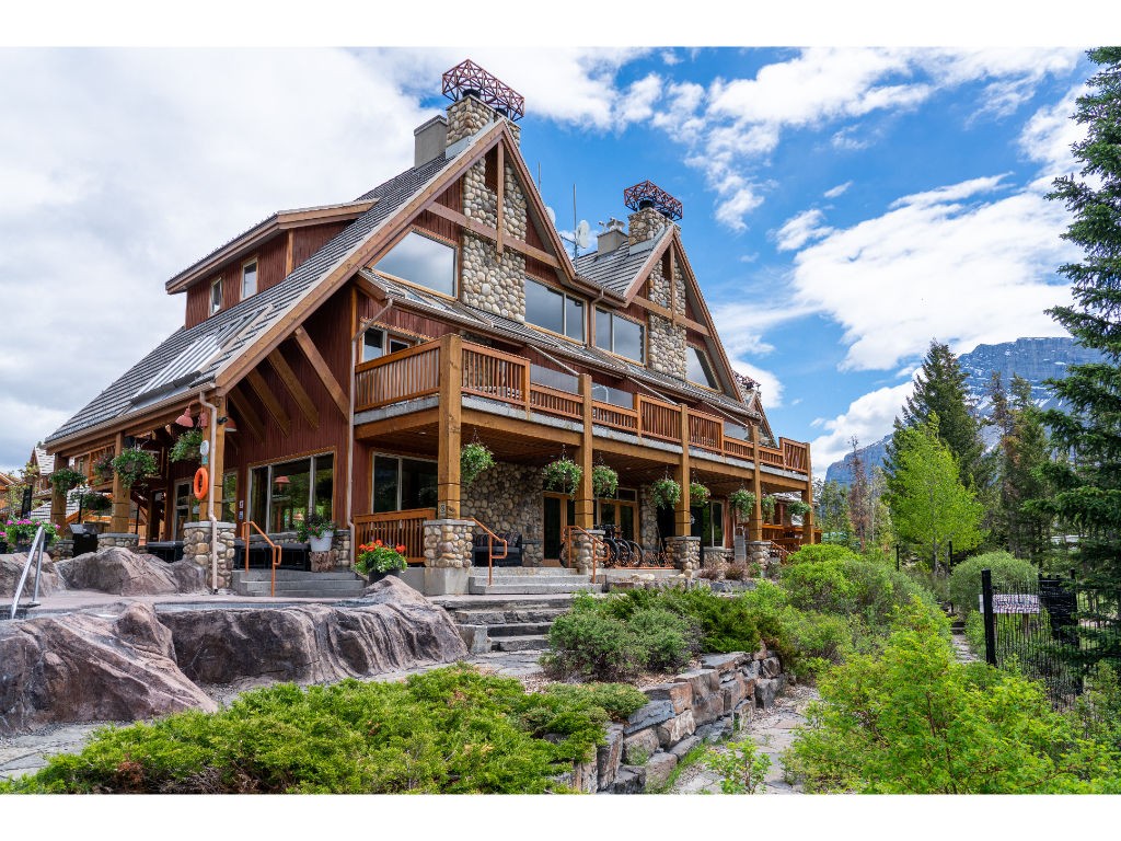 image Escape to luxury at Hidden Ridge Resort in Banff with stunning mountain views and a cozy mountain retreat.