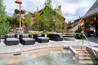 Relax in style at Hidden Ridge Resort in Banff, with spacious outdoor lounges and stunning views.