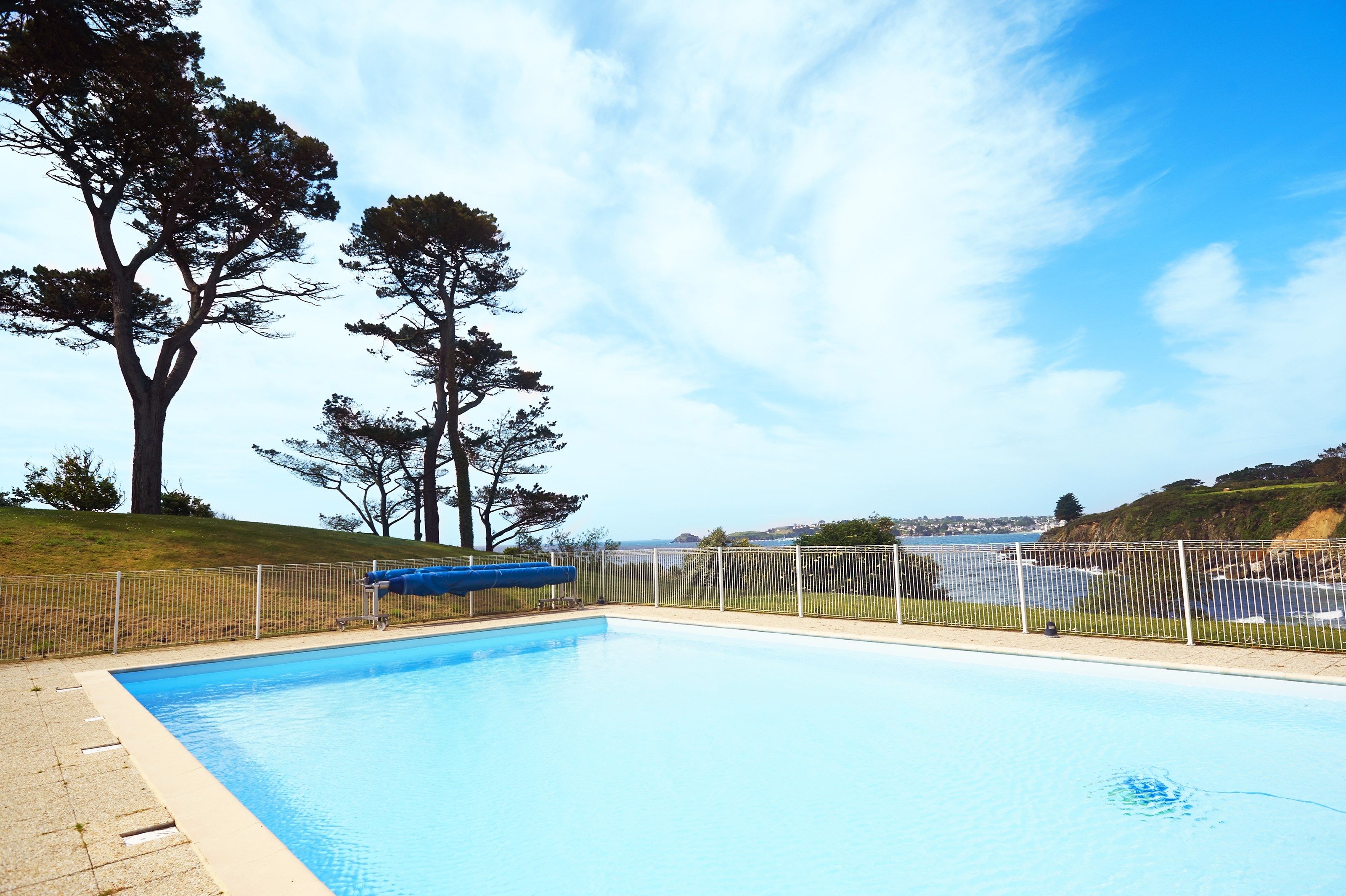image You will love to cool off in the gorgeous, seasonal outdoor pool.