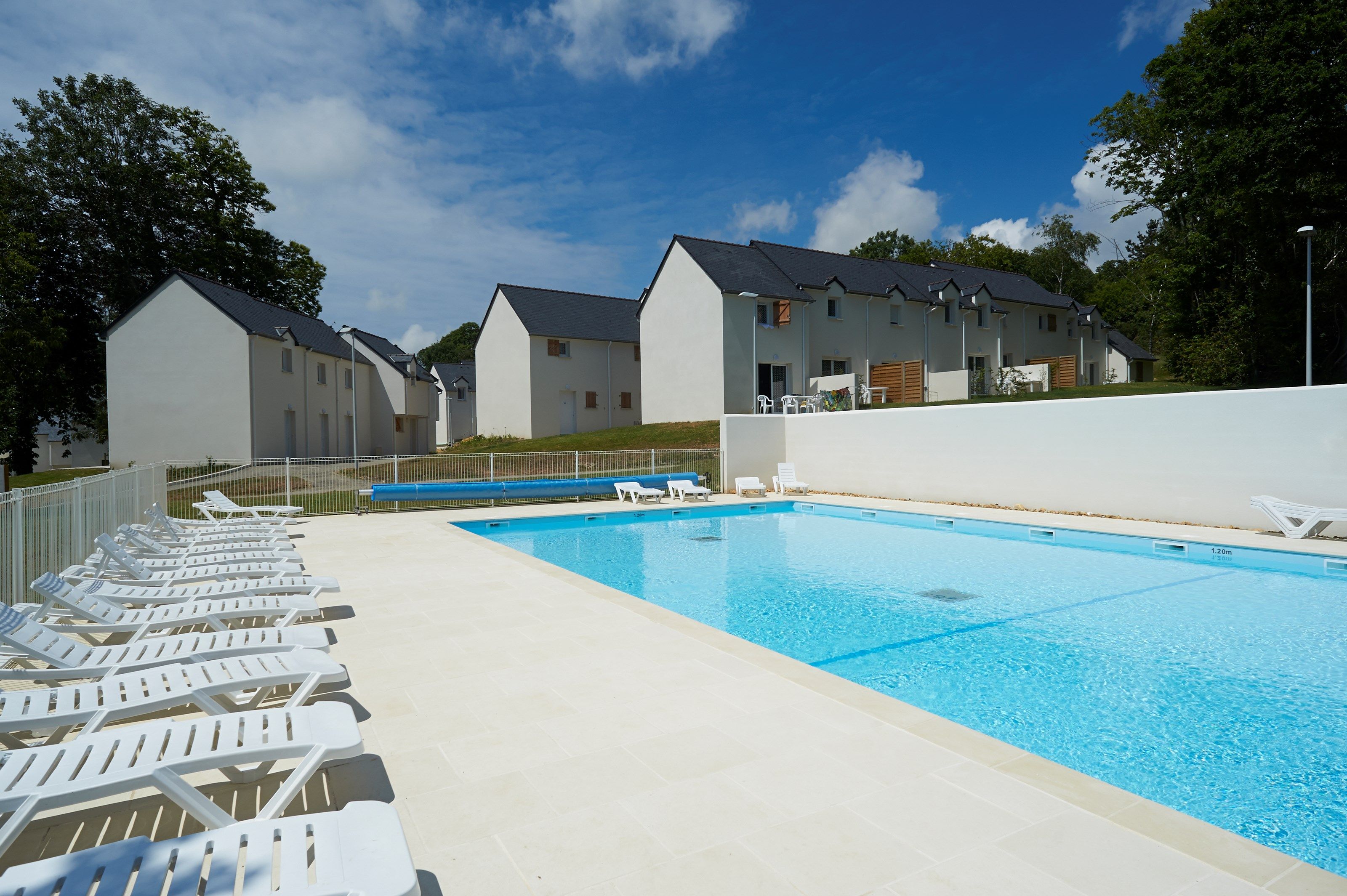 image Dive into the outdoor pool during the summer.