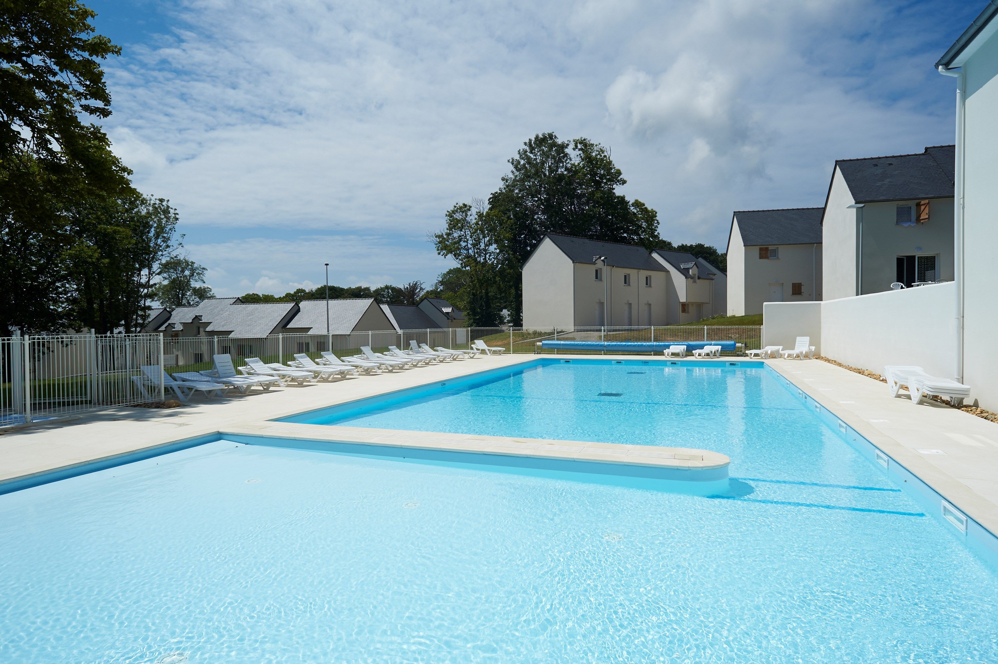 image You will love to spend time with family and friends at this outdoor pool, open in the summer.