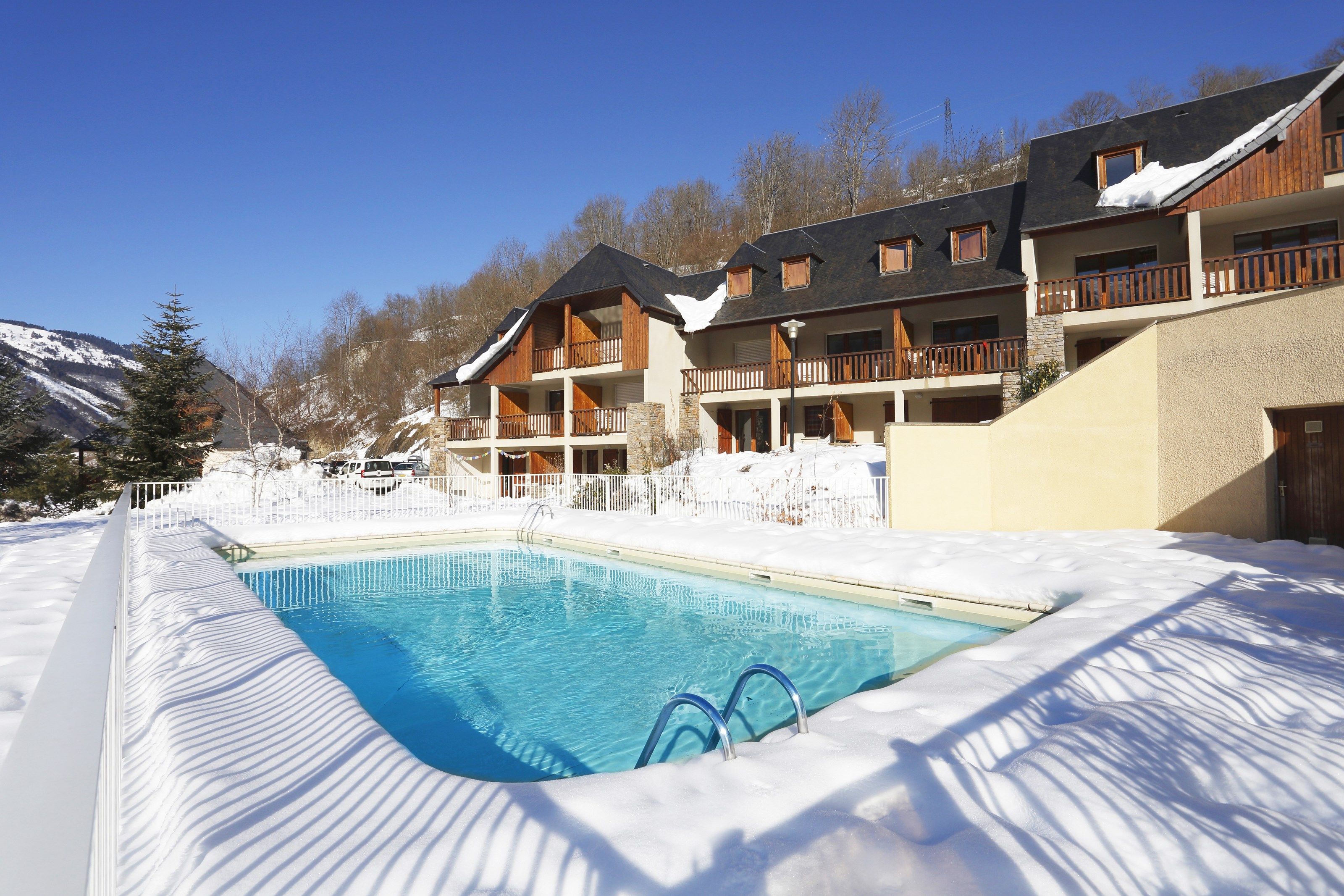 image Dive into the lovely outdoor pool on a warm spring or fall day.